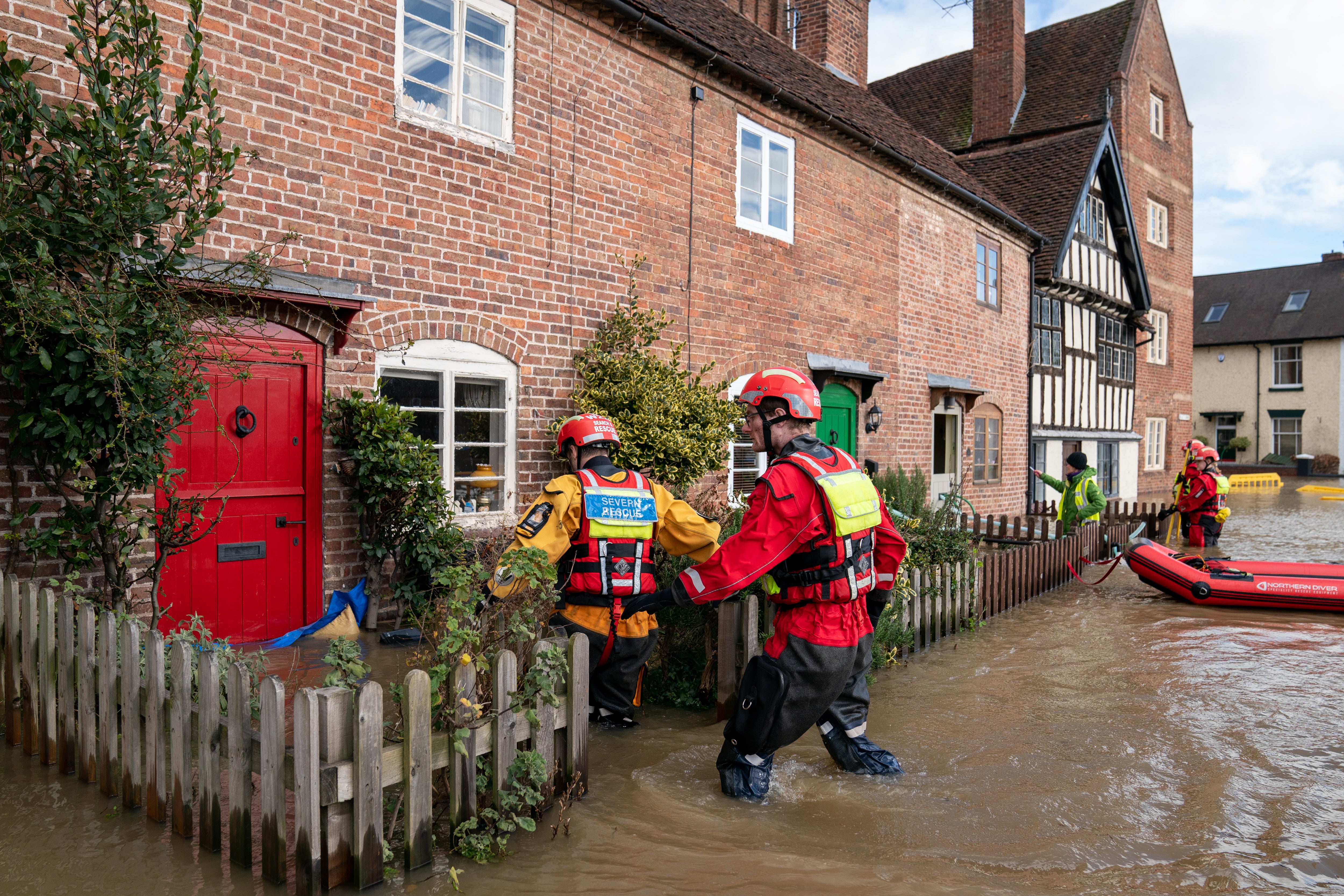 Search and rescue teams checking on residents in Bewdley, Worcestershire on Wednesday