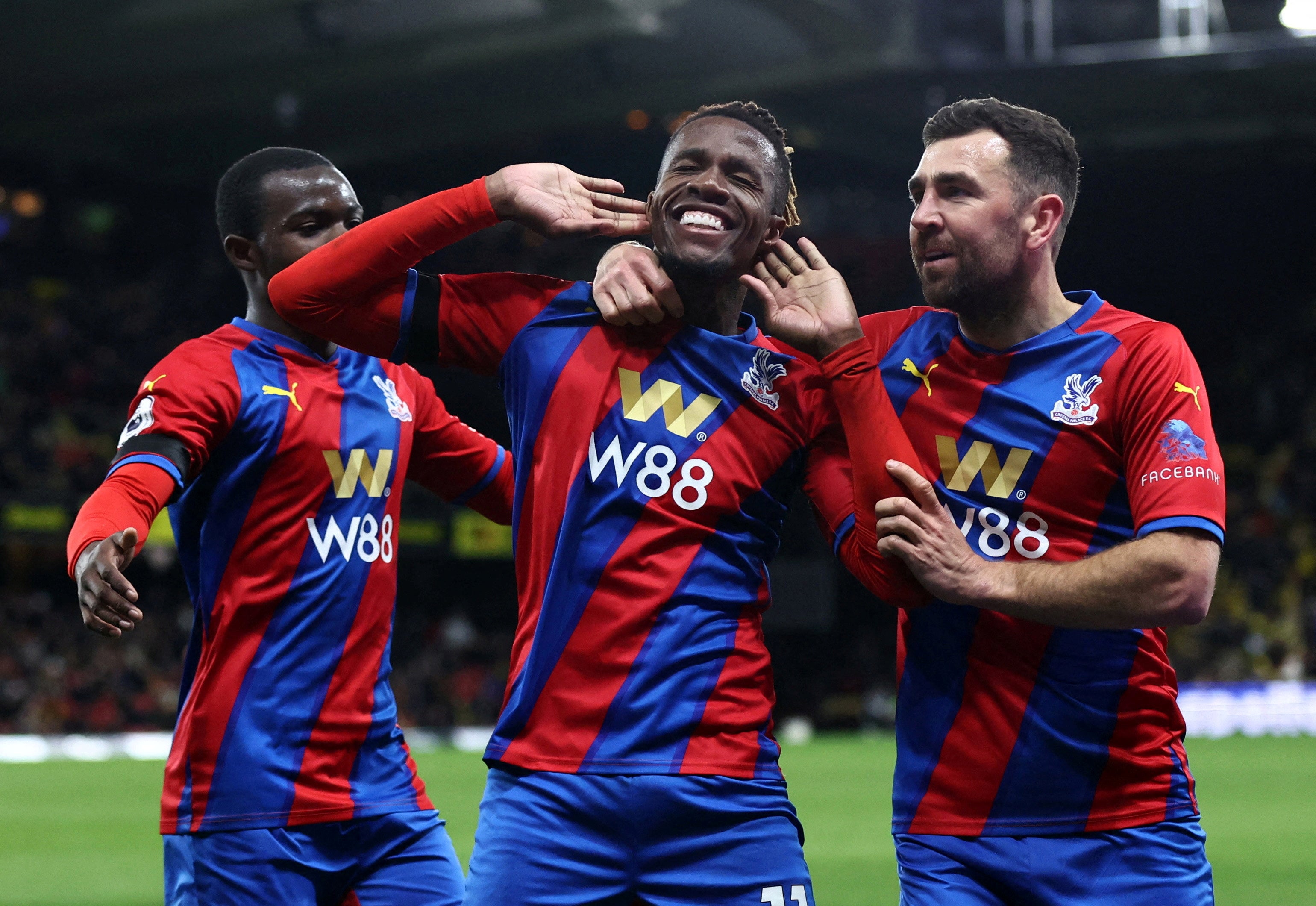 Wilfried Zaha celebrates scoring Palace’s third goal