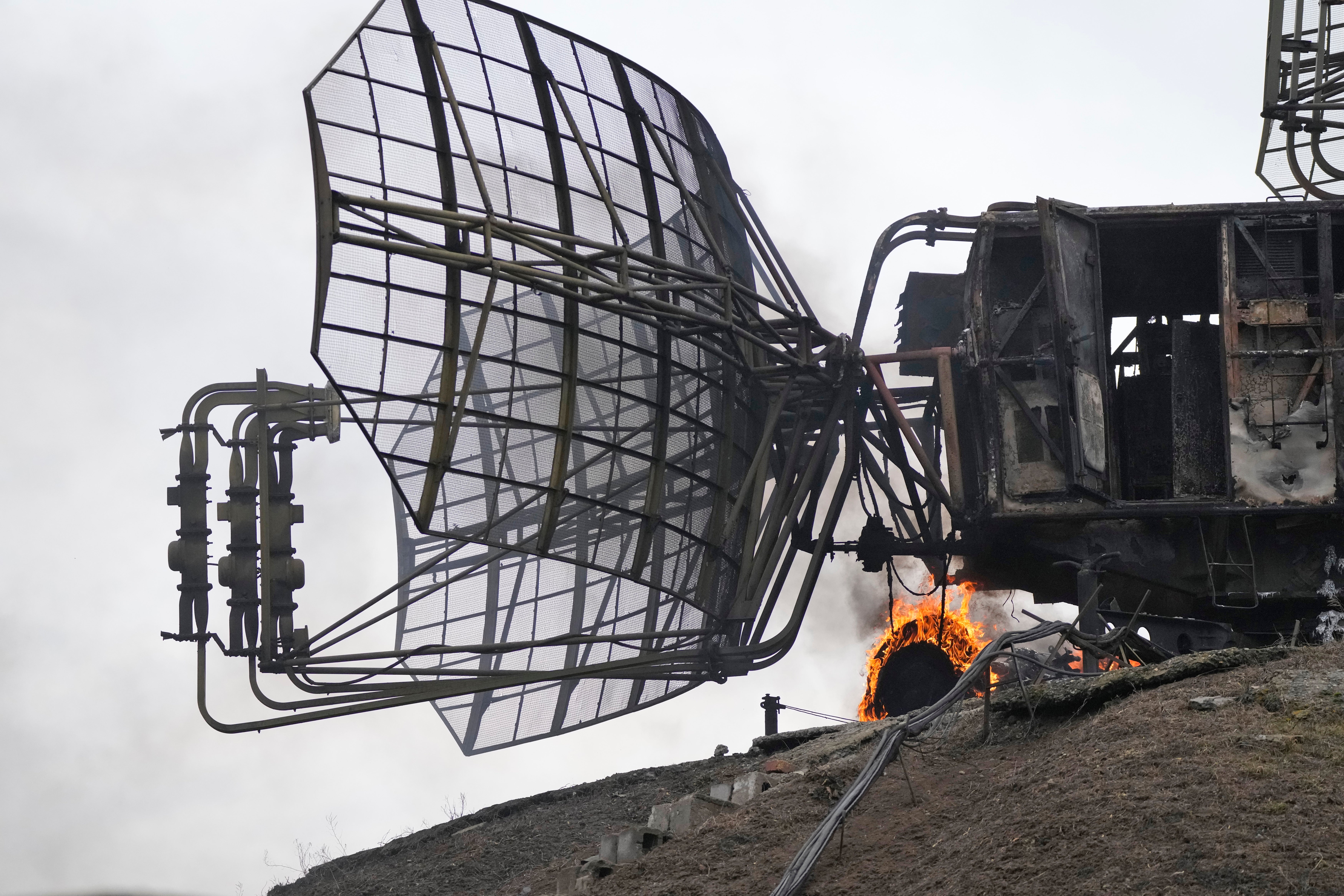 Damaged radar arrays and other equipment is seen at Ukrainian military facility outside Mariupol, Ukraine, Thursday, 24 February 2022