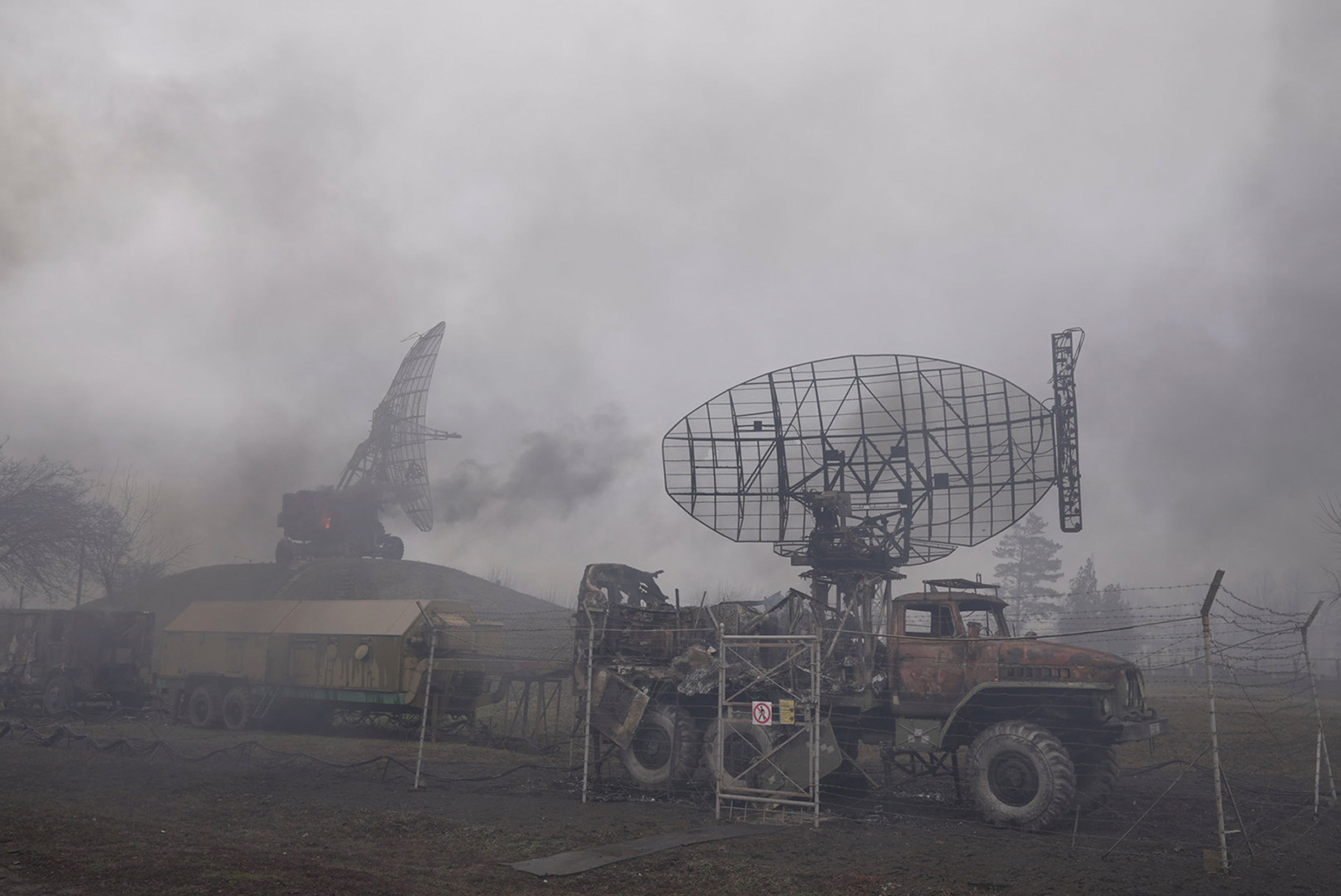 Smoke rise from an air defense base in the aftermath of an apparent Russian strike in Mariupol, Ukraine, Thursday, 24 February 2022