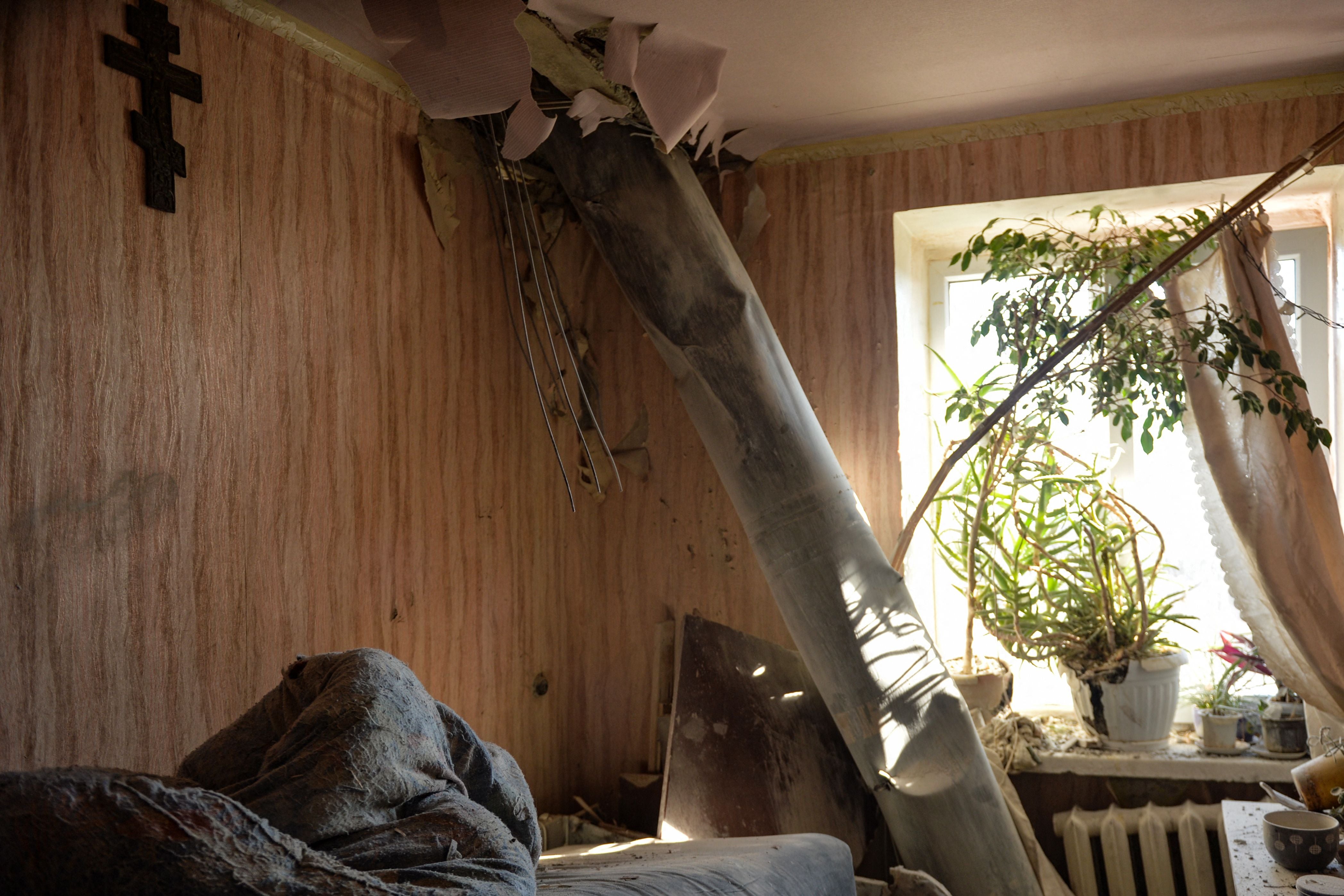 The body of a rocket stuck in a flat after recent shelling on the northern outskirts of Kharkiv on 24 February 2022