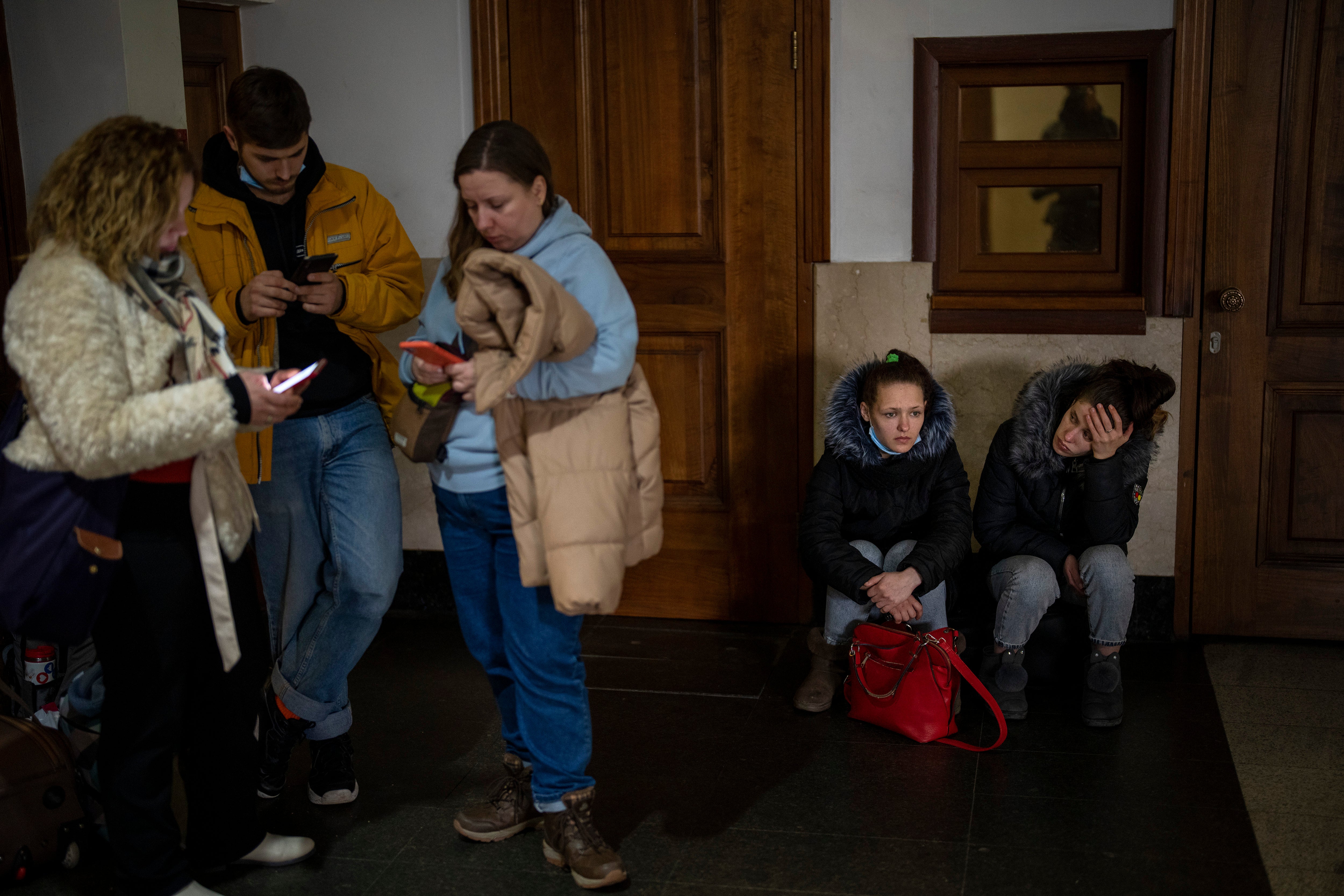 People shelter at the Kyiv train station, Ukraine, Thursday, 24 February 2022