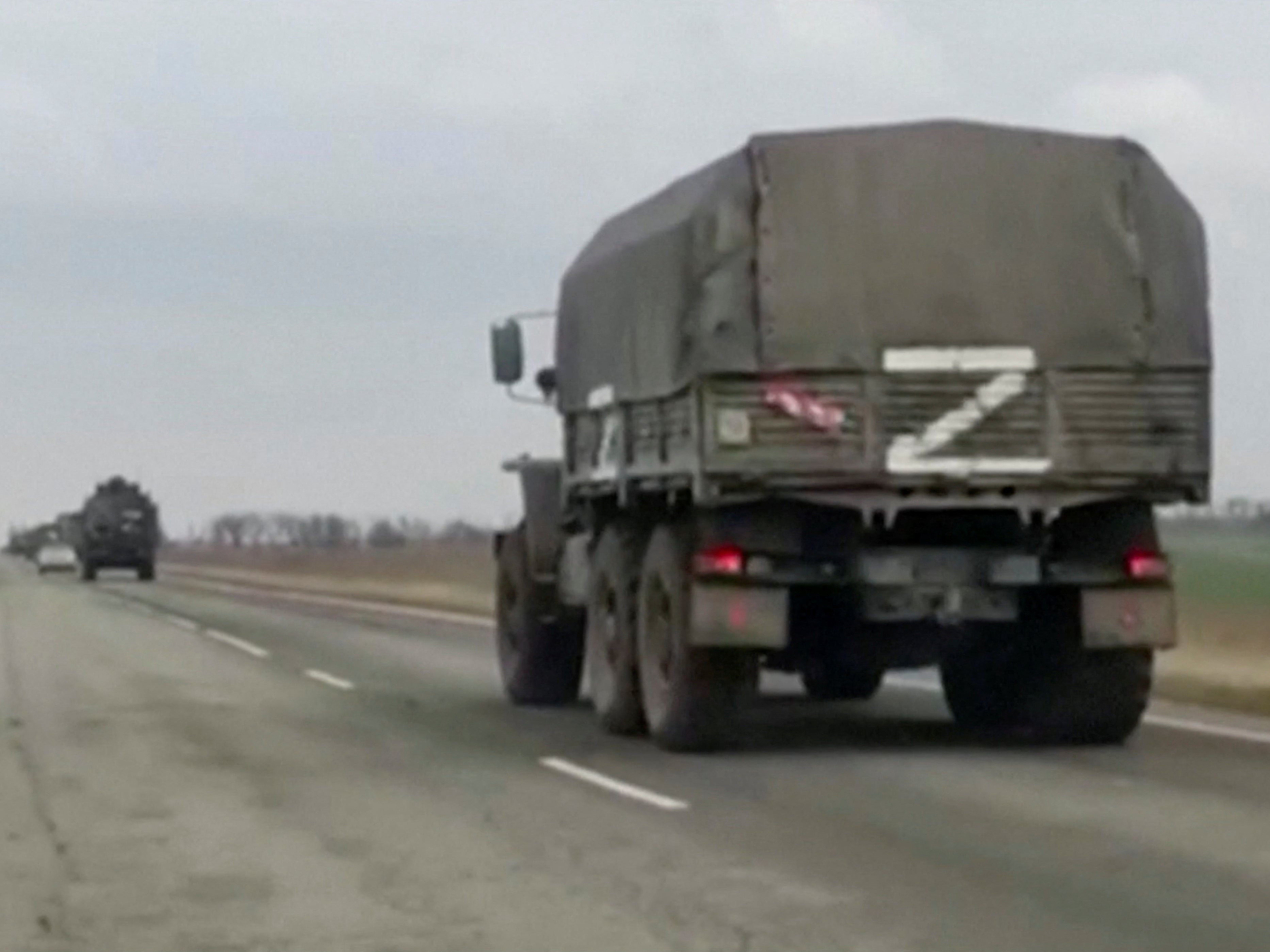 Military trucks, with letter 'Z' on them, drive near Armyansk, in Crimea