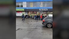 Luhansk citizens queue at banks and ATMs as Russia launches Ukraine invasion