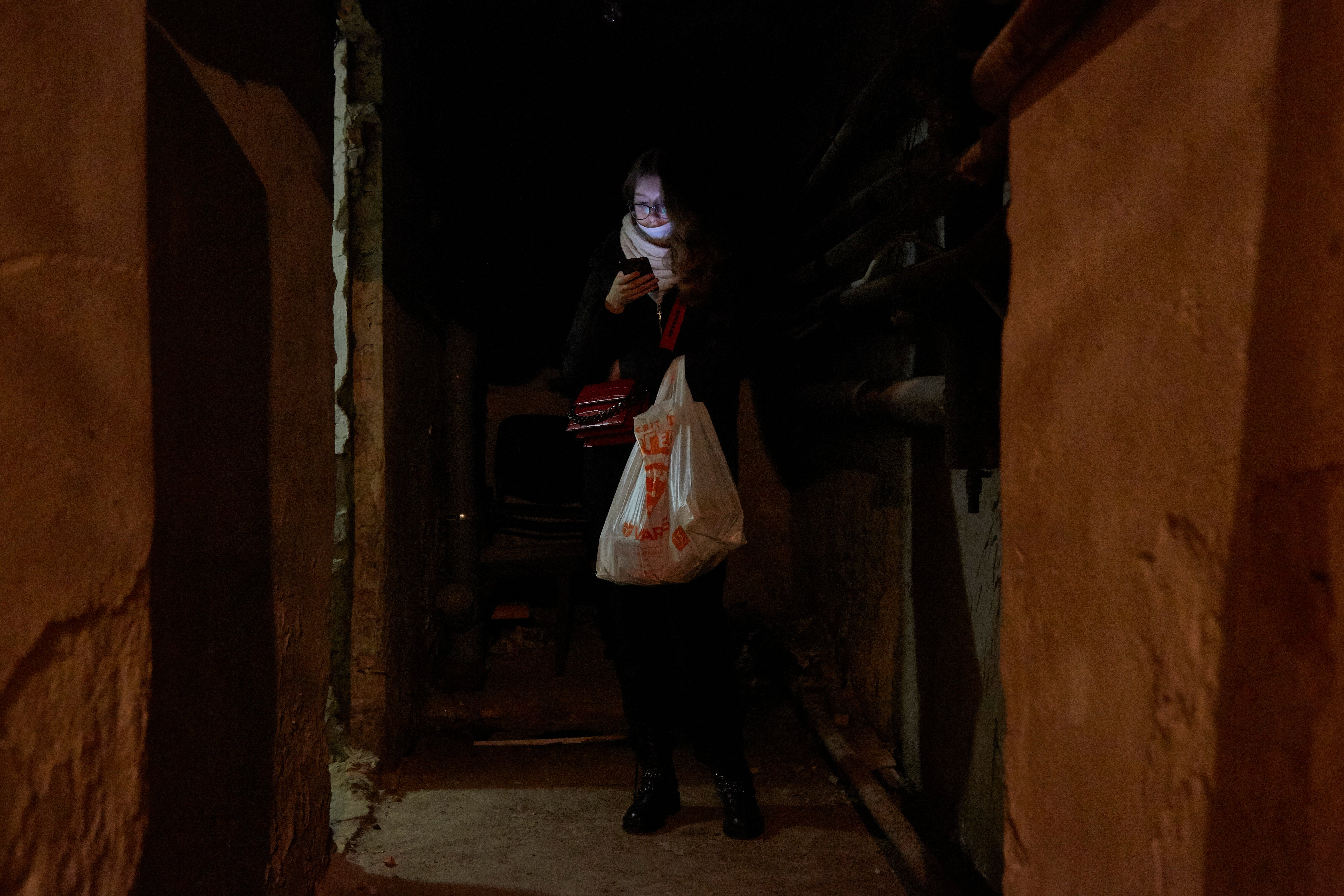 Another civilian in a bomb shelter in Kyiv on 24 February