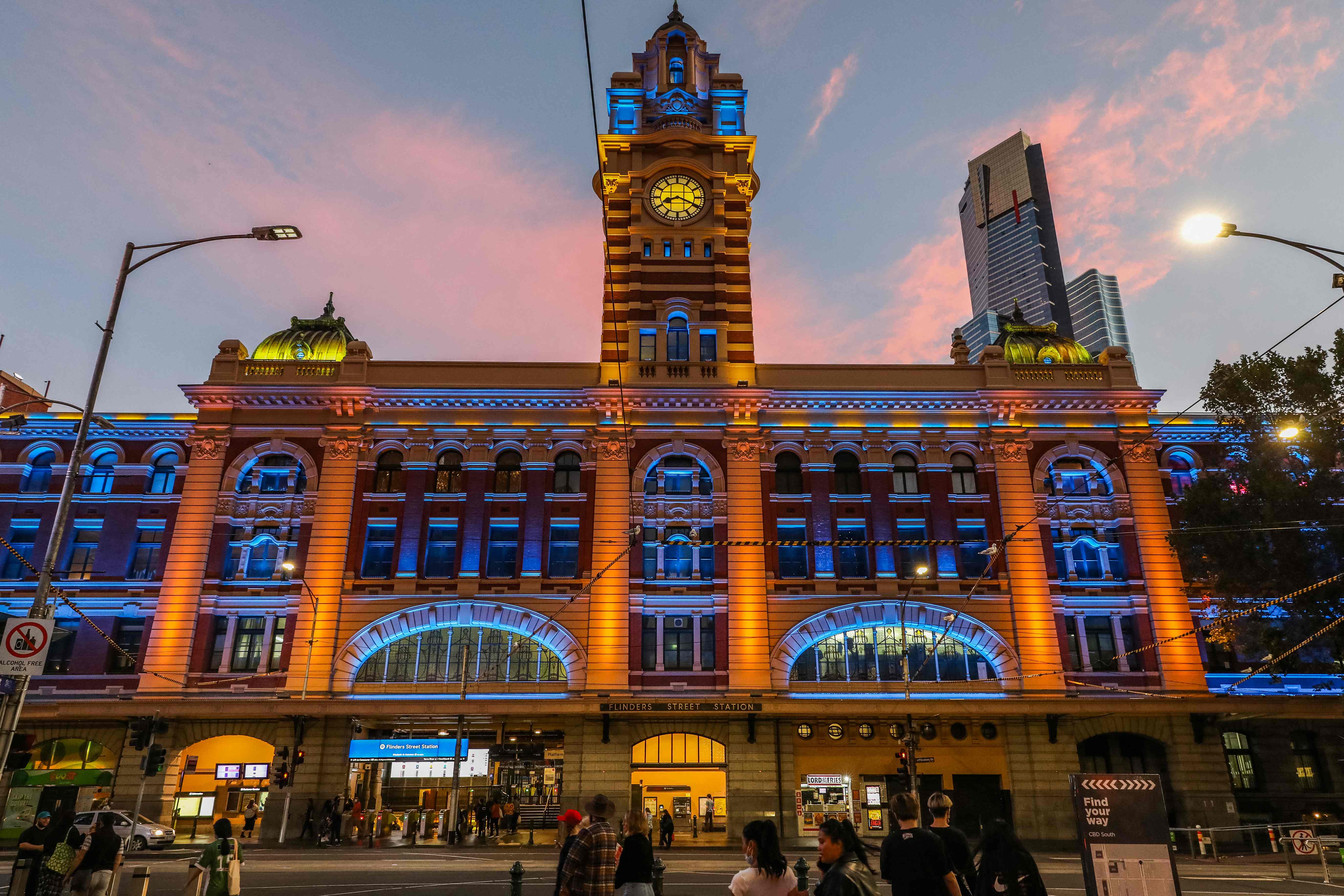 A general view of Flinders Street Station as it is lit in yellow and blue in Melbourne, as public buildings lit up in the national colours of Ukraine as a show of support