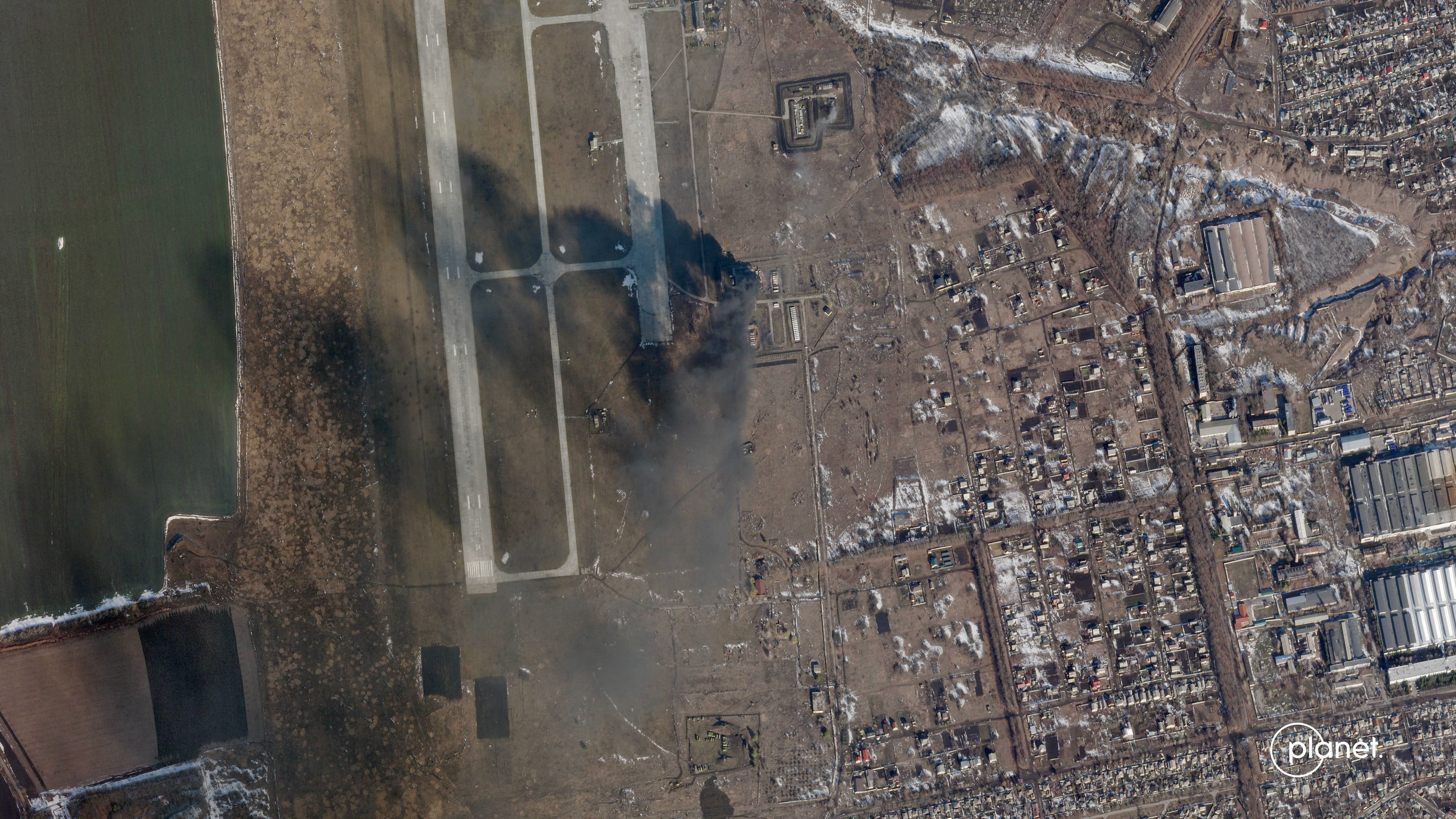 A satellite image appears to show damage to an airfield in eastern Ukraine (Planet Labs PBC)