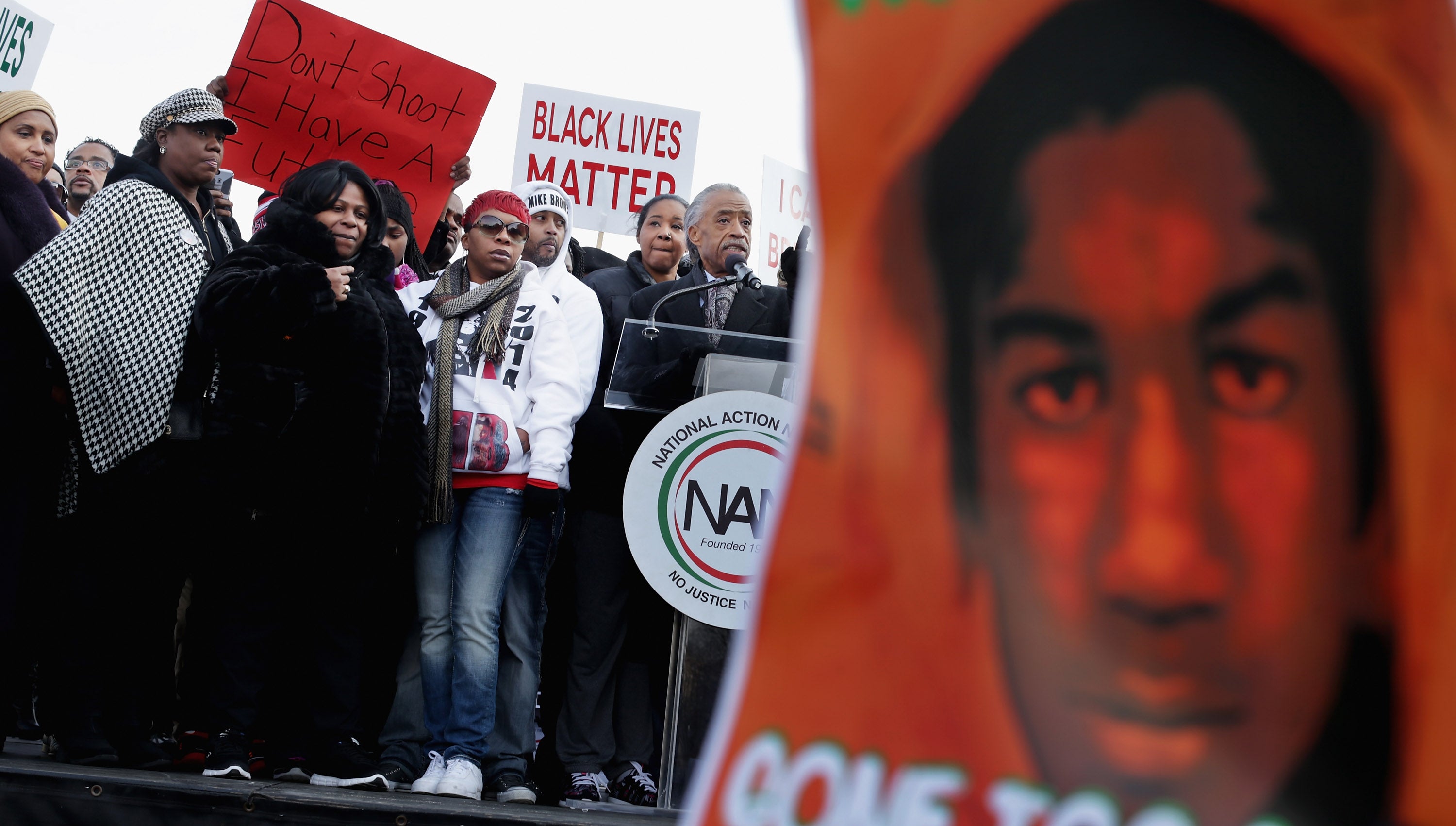 Parents of those killed by guns, including Trayvon’s mother, Sybrina Fulton (wearing a checked hat), helped push the cause of Black Lives Matter