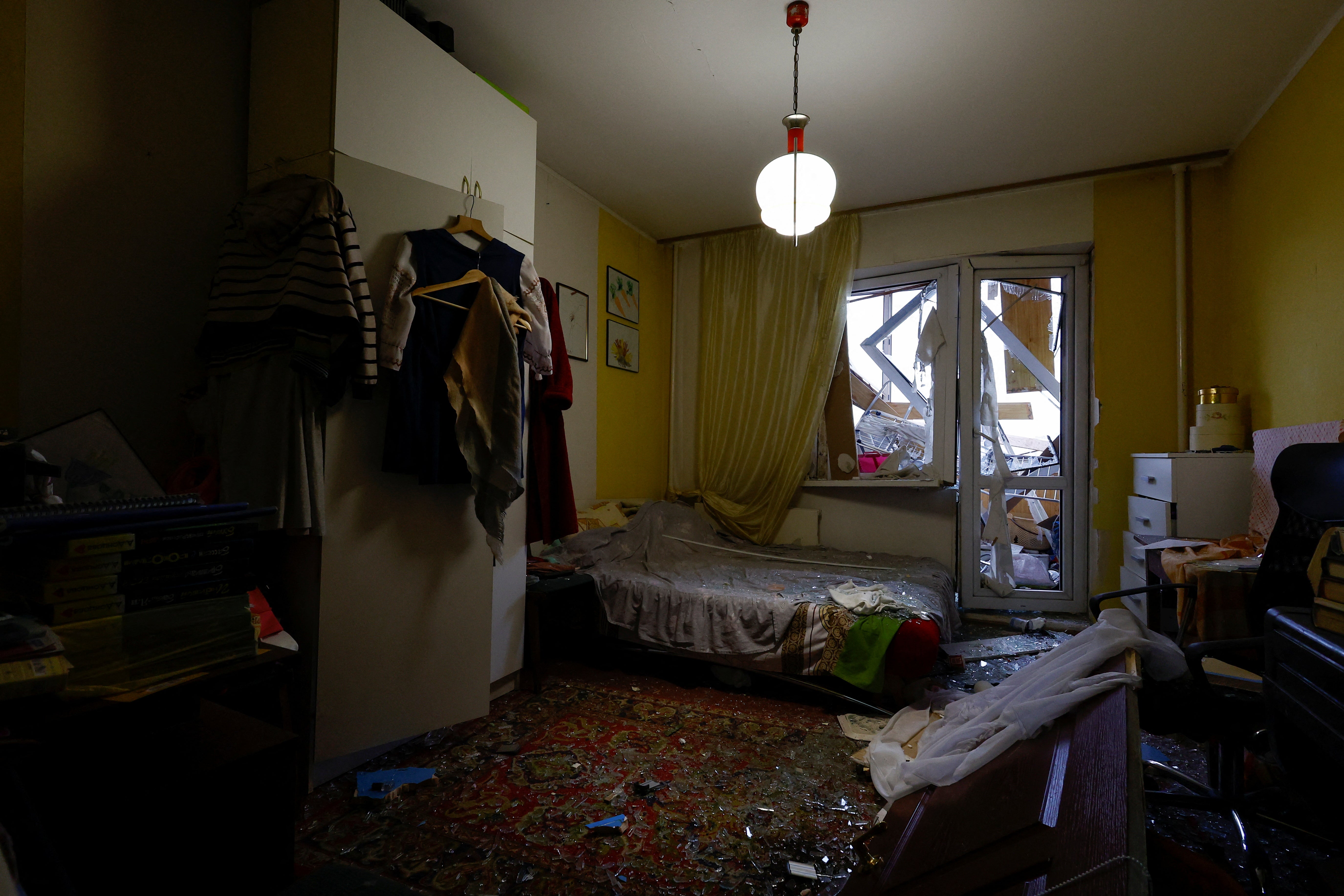 A room of a damaged residential building is seen, after Russia launched a massive military operation against Ukraine, in Kyiv