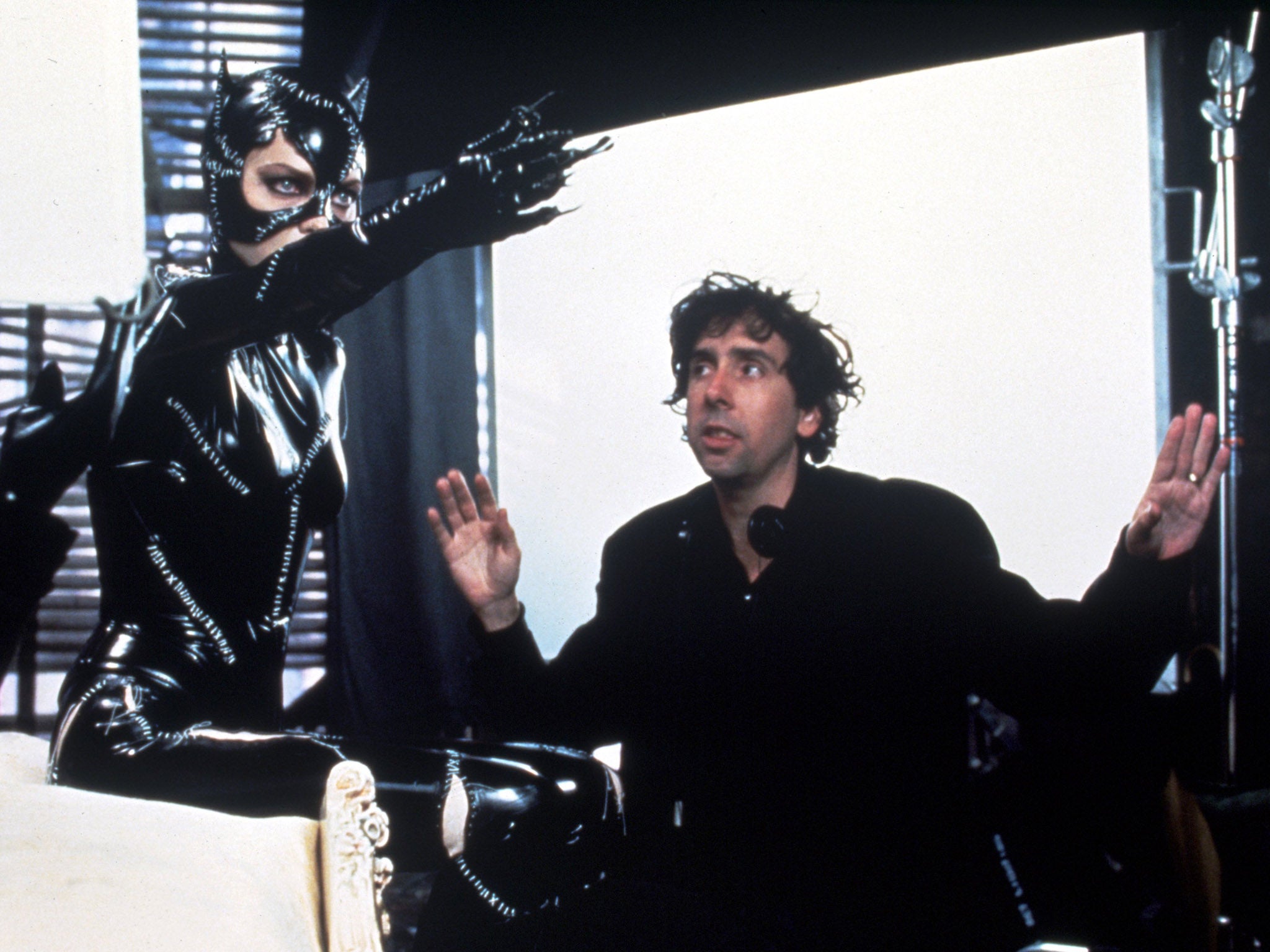 Tim Burton directs Michelle Pfeiffer on the set of ‘Batman Returns'