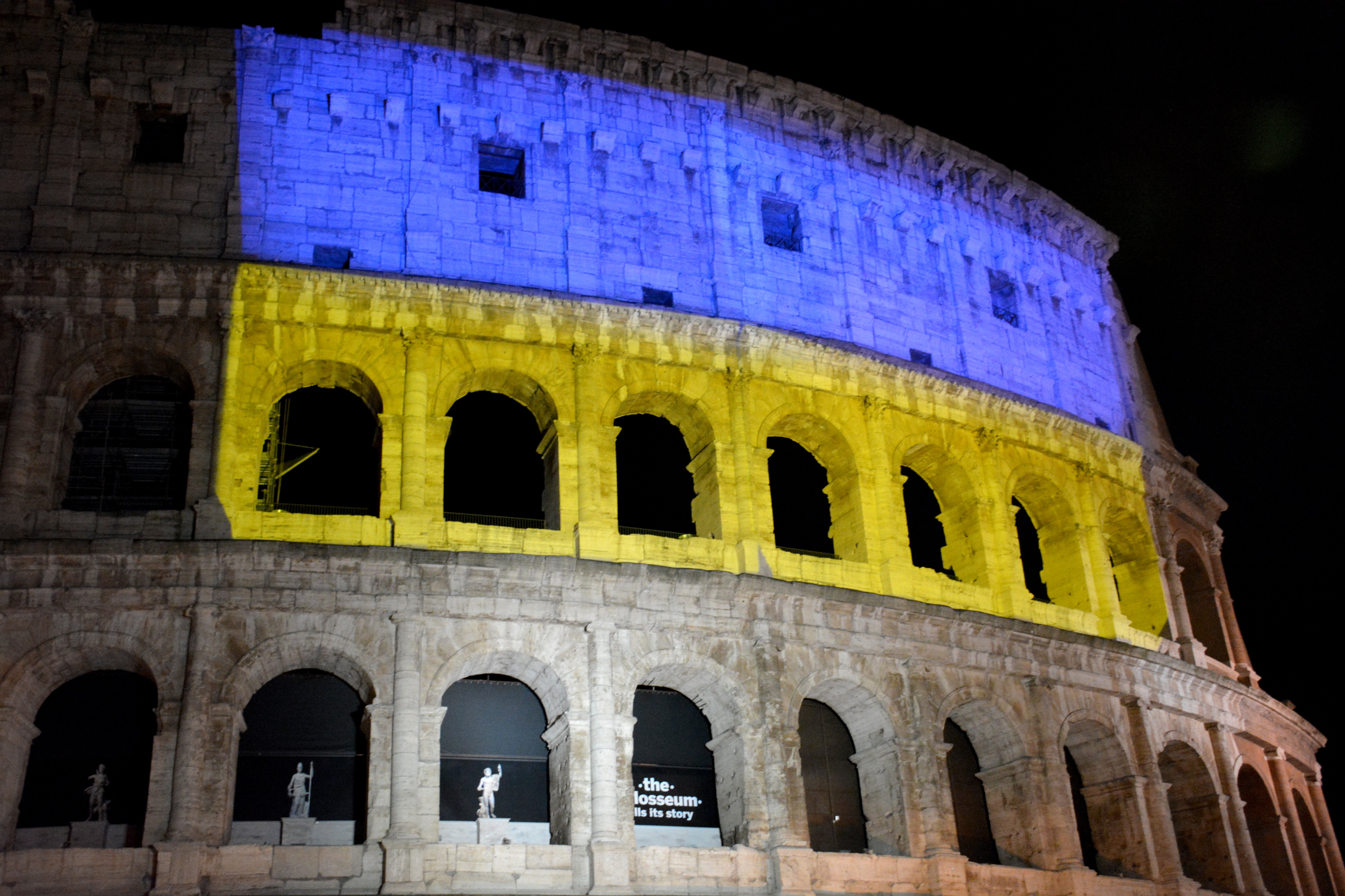 The Colosseum illuminated with the colours of the Ukrainian national flag