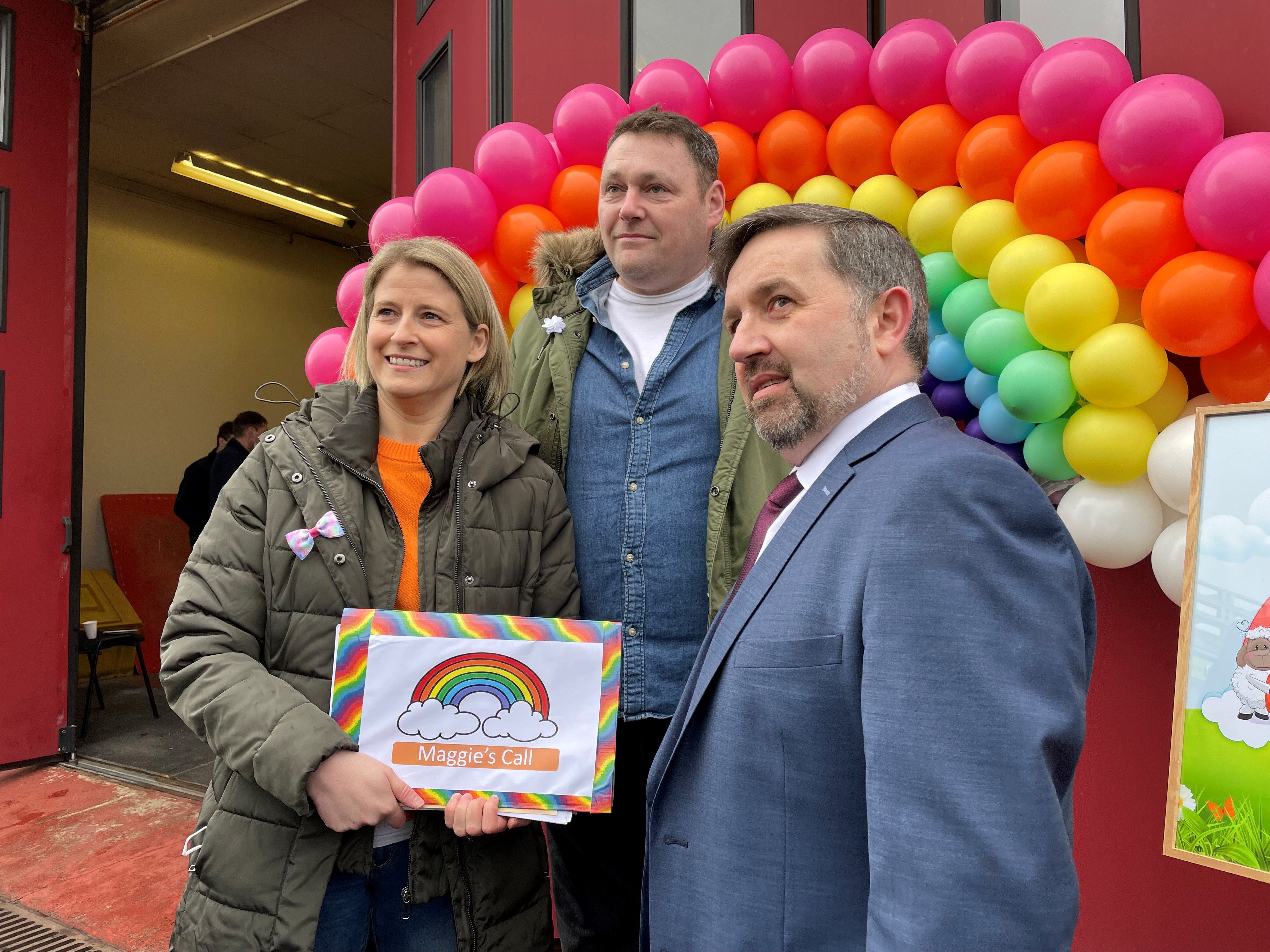 Health Minister Robin Swann, right, with the parents of Maggie Black, Sheenagh and Brian Black (Jonathan McCambridge/PA)