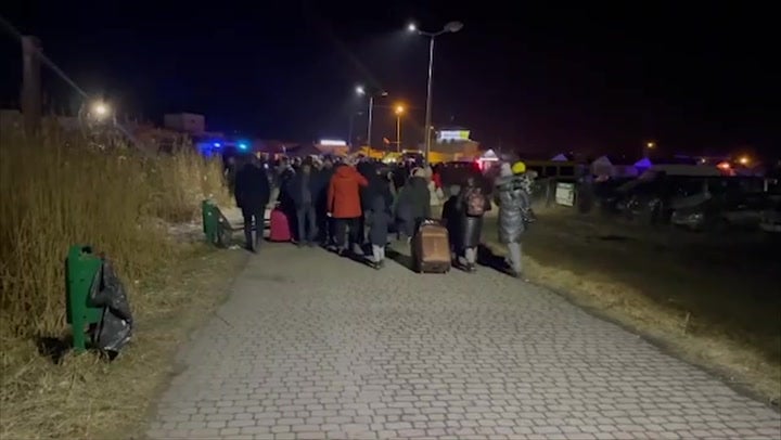 Chaos at Poland border as families with children flee Ukraine amid Russian invasion