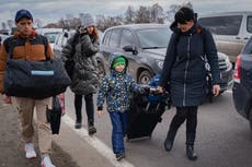 The 40-kilometre queue to flee Ukraine: Thousands of families rush to leave as Russian army advances