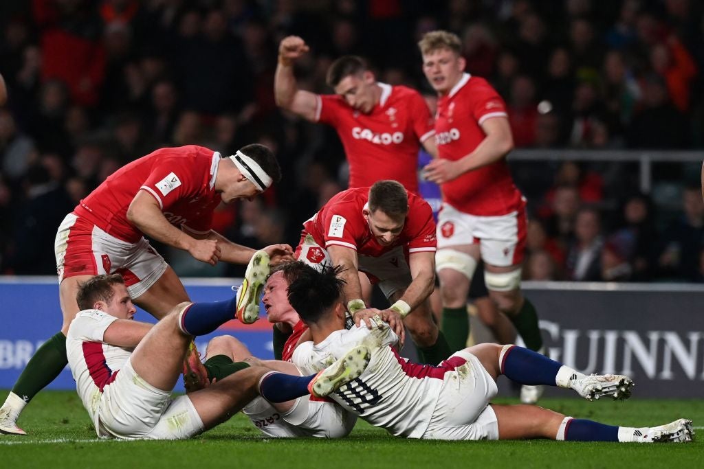 Centre Nick Tompkins scores the second Welsh try