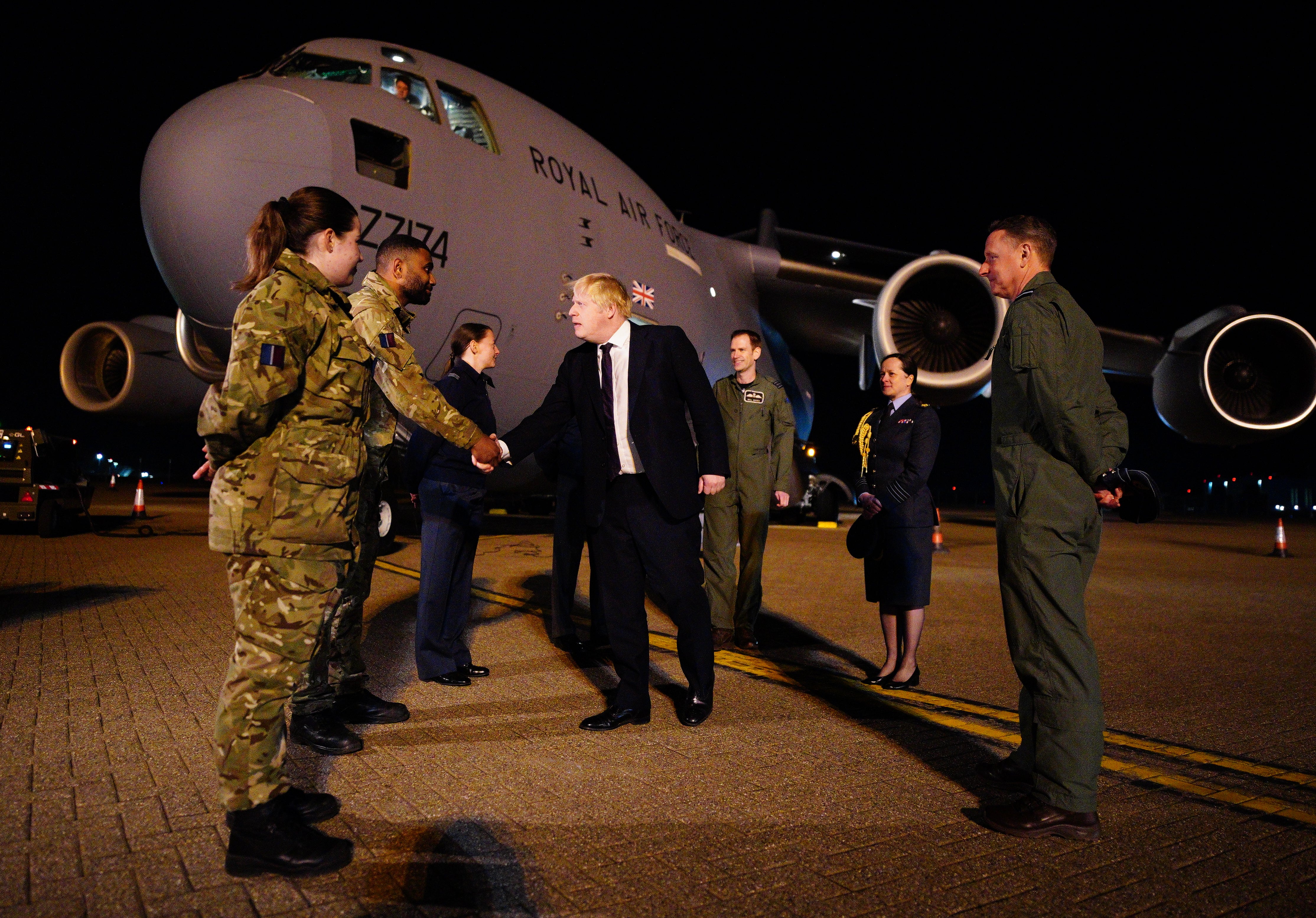 Prime Minister Boris Johnson meeting military personnel at RAF Brize Norton (Ben Birchall/PA)