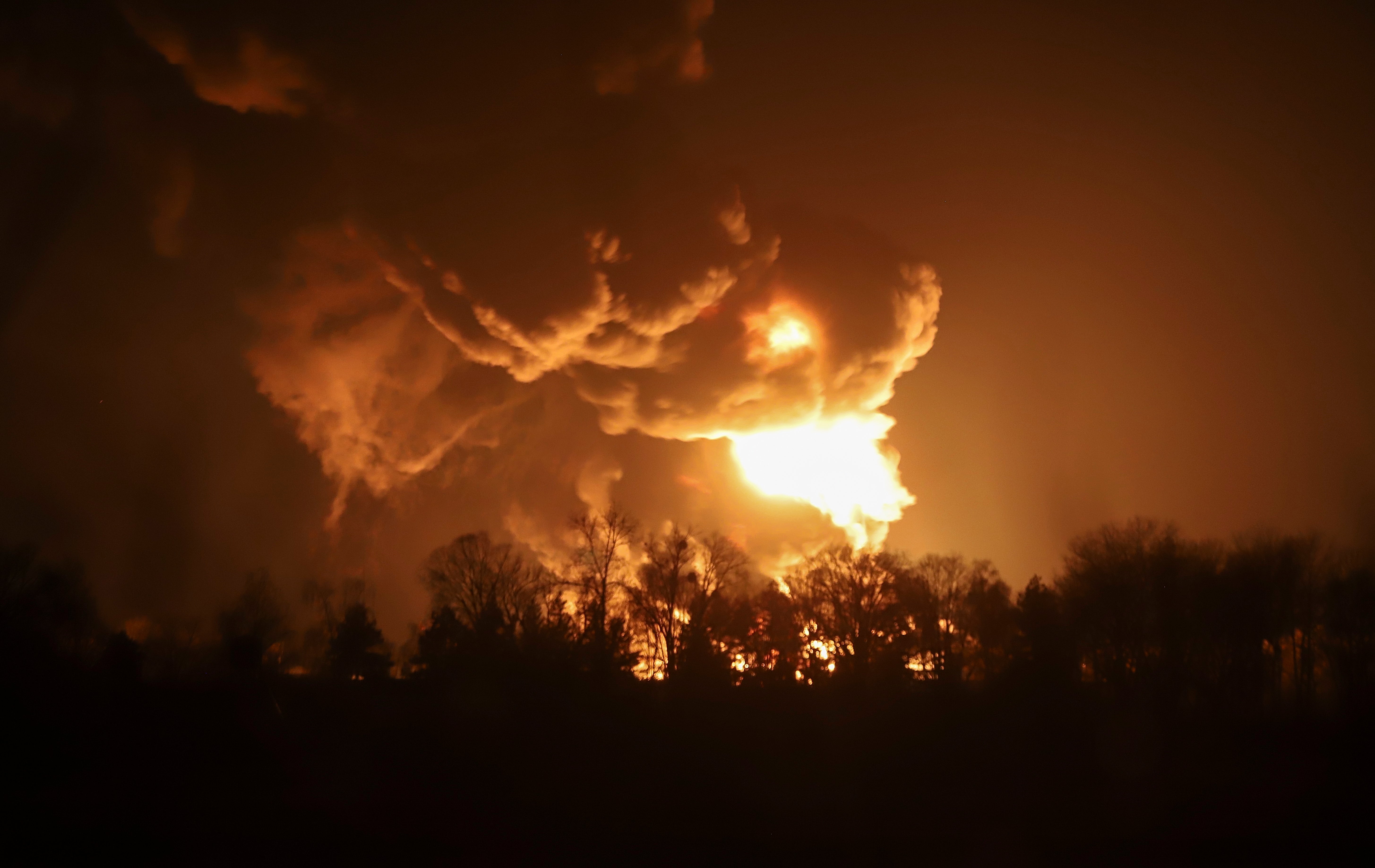 Flames rise from a fire at an oil depot hit by a Russian missile attack in Vasylkiv, near Kyiv, on Sunday morning