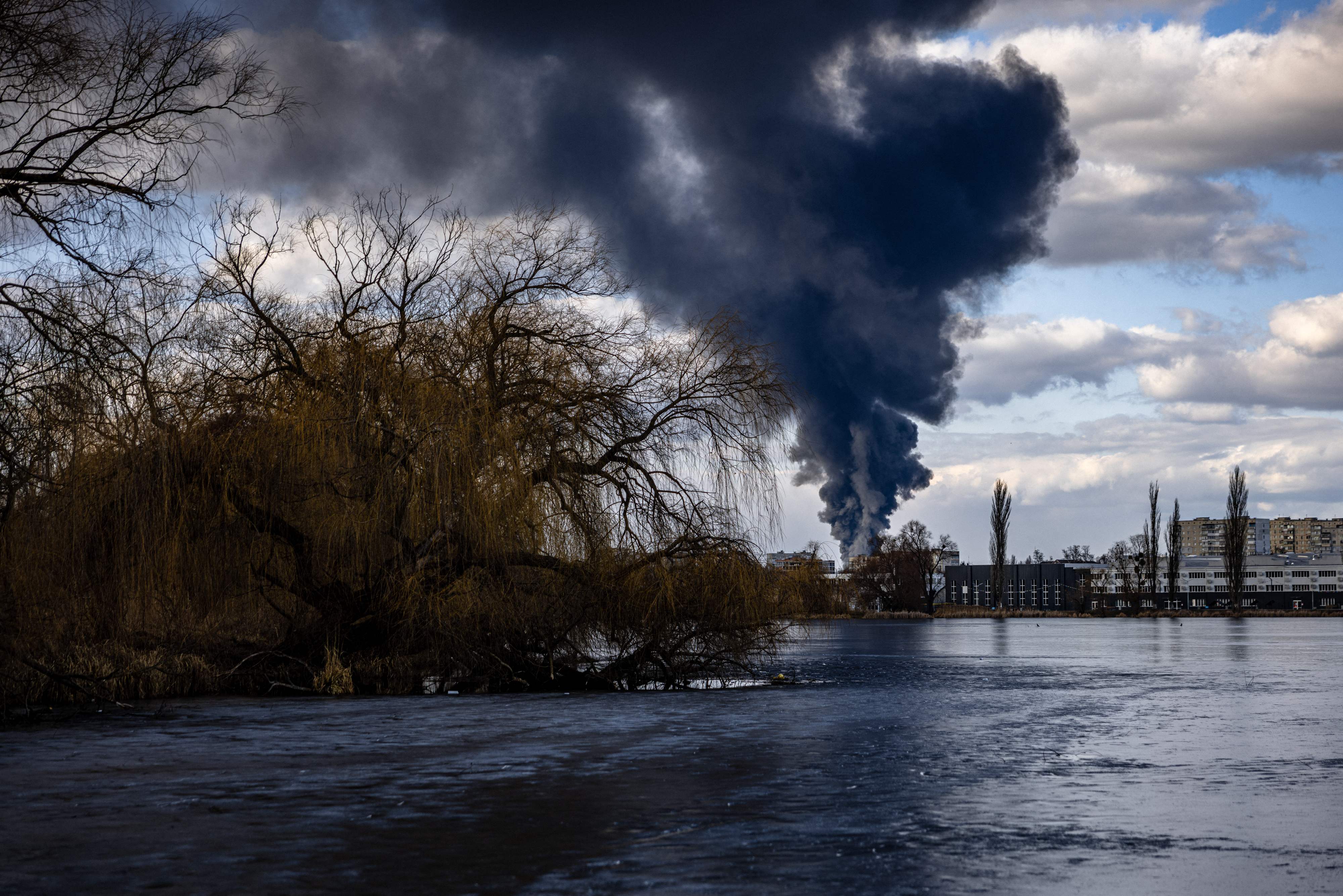 Smoke billows over the town of Vasylkiv just outside Kyiv