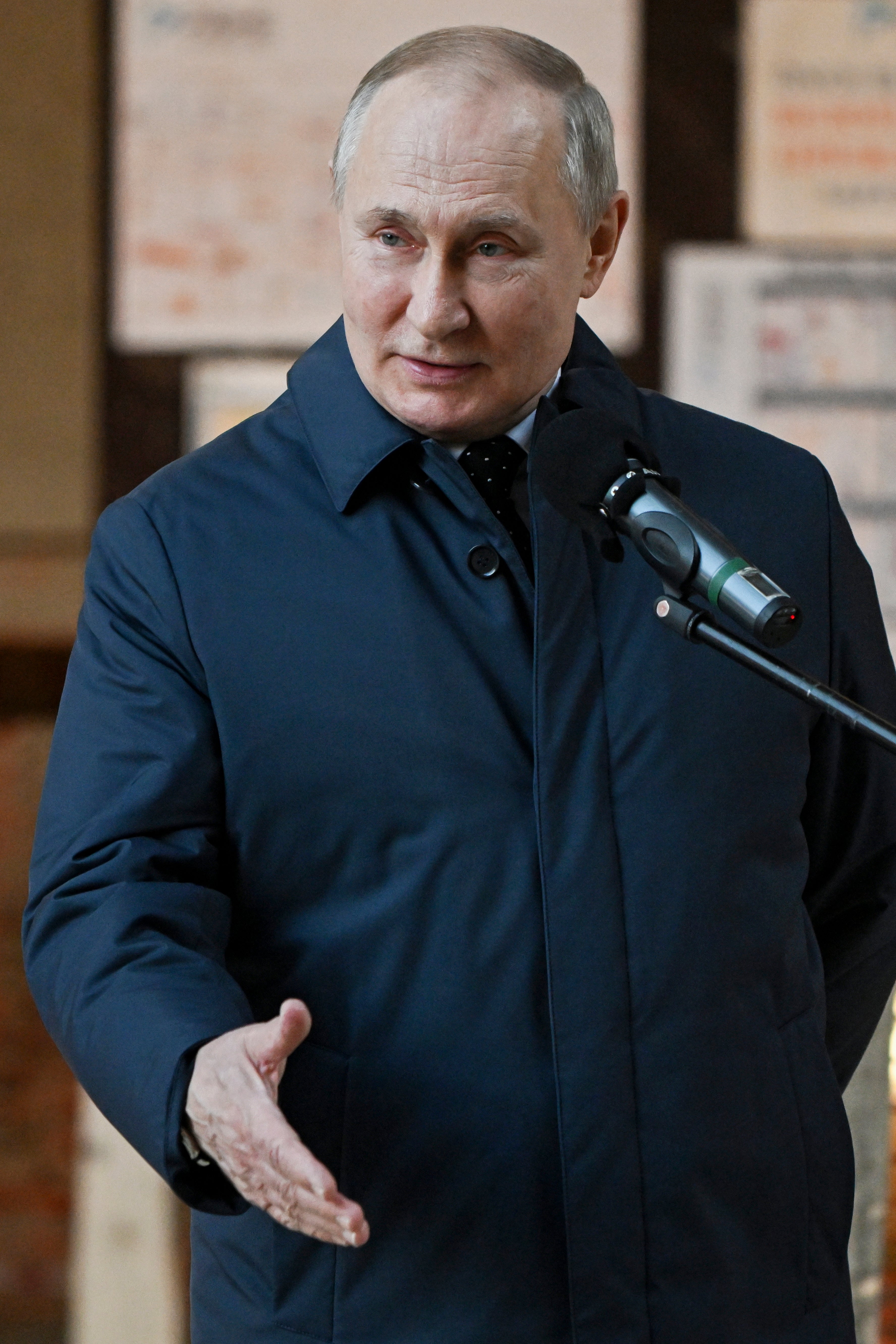 Russian president Vladimir Putin speaks as he visits the construction site of the National Space Agency in Moscow on Sunday