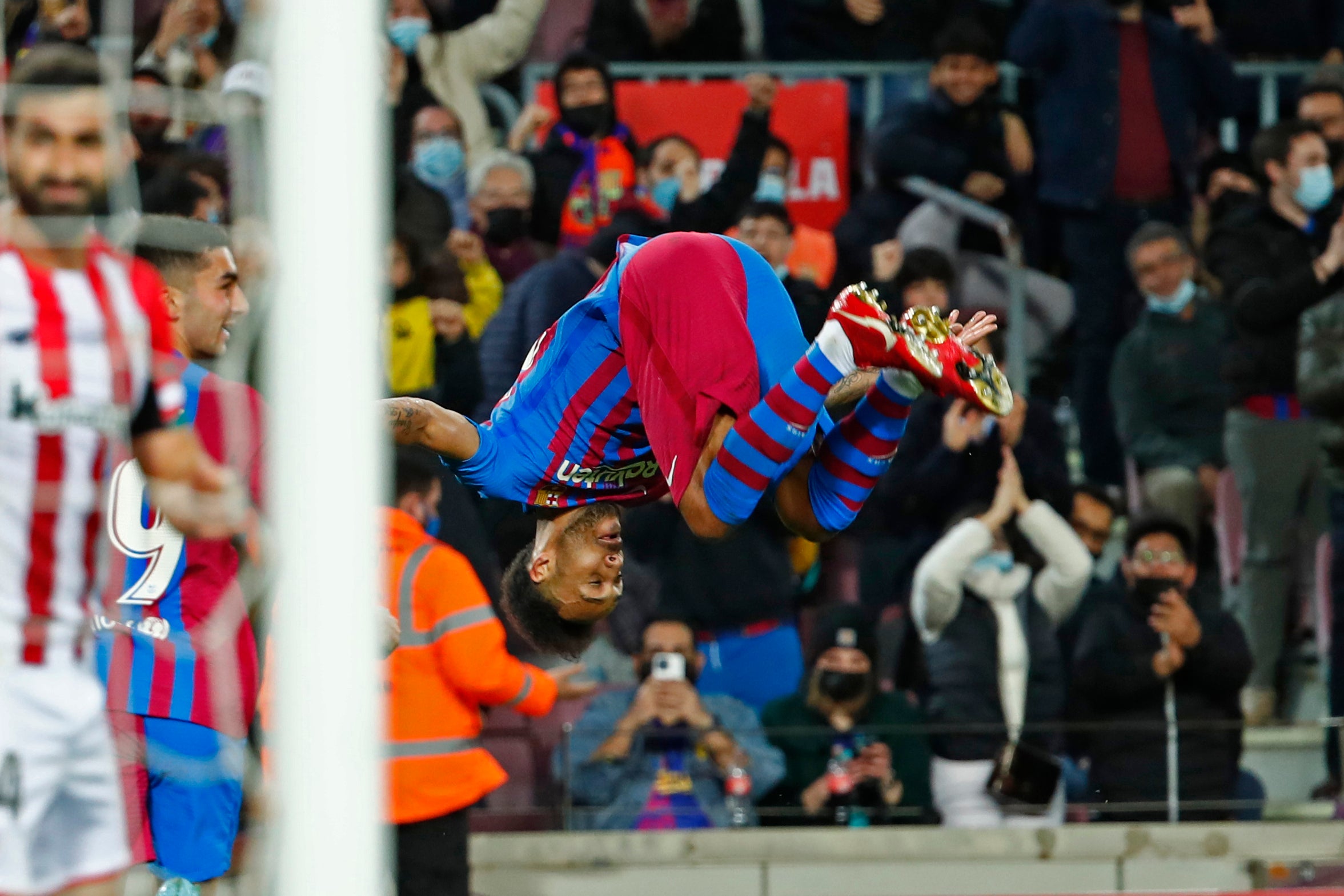 Former Arsenal captain Pierre-Emerick Aubameyang celebrates his strike (Joan Monfort/AP)