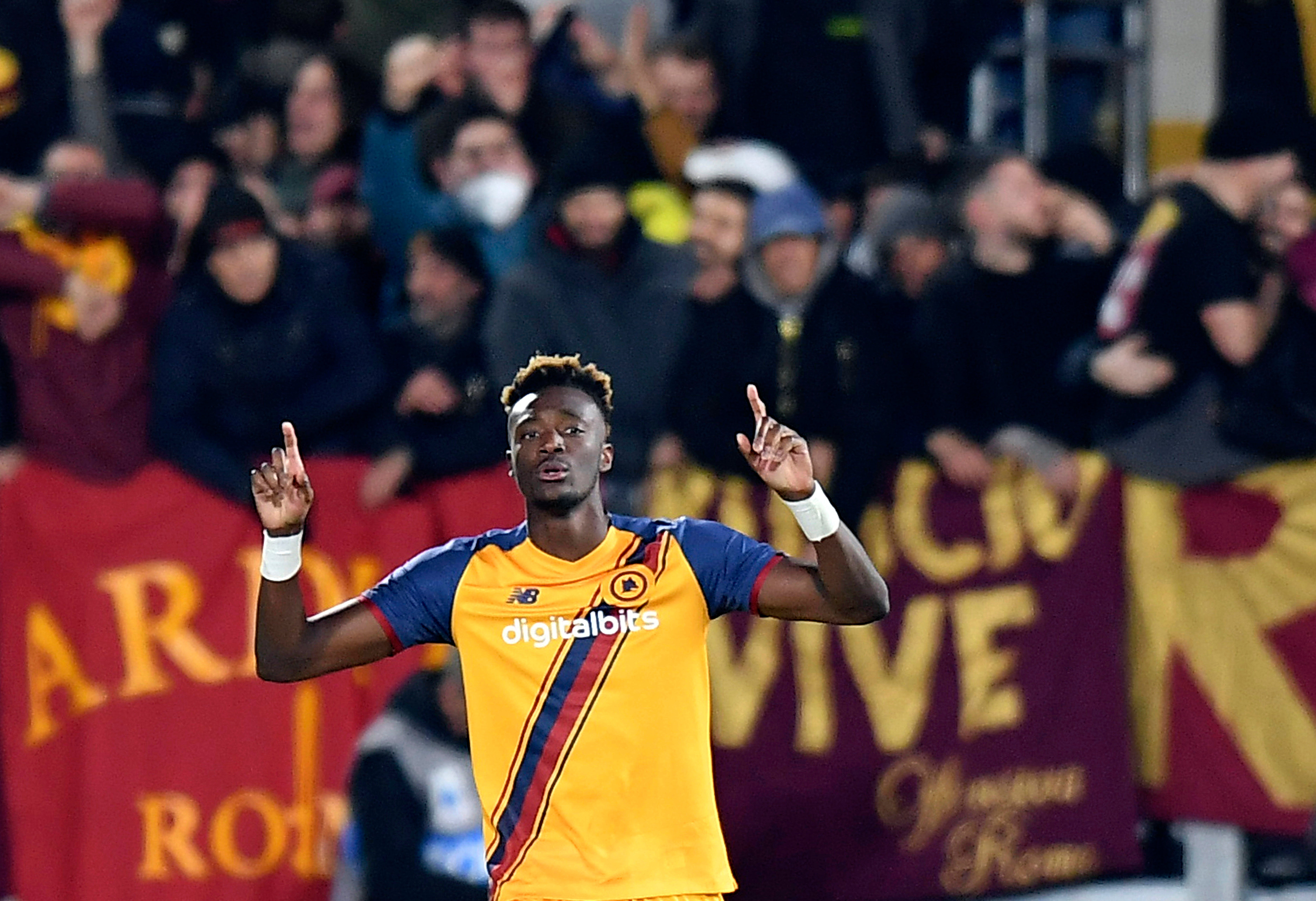 Tammy Abraham celebrates after scoring a late winner for Roma (Tano Pecoraro/AP)