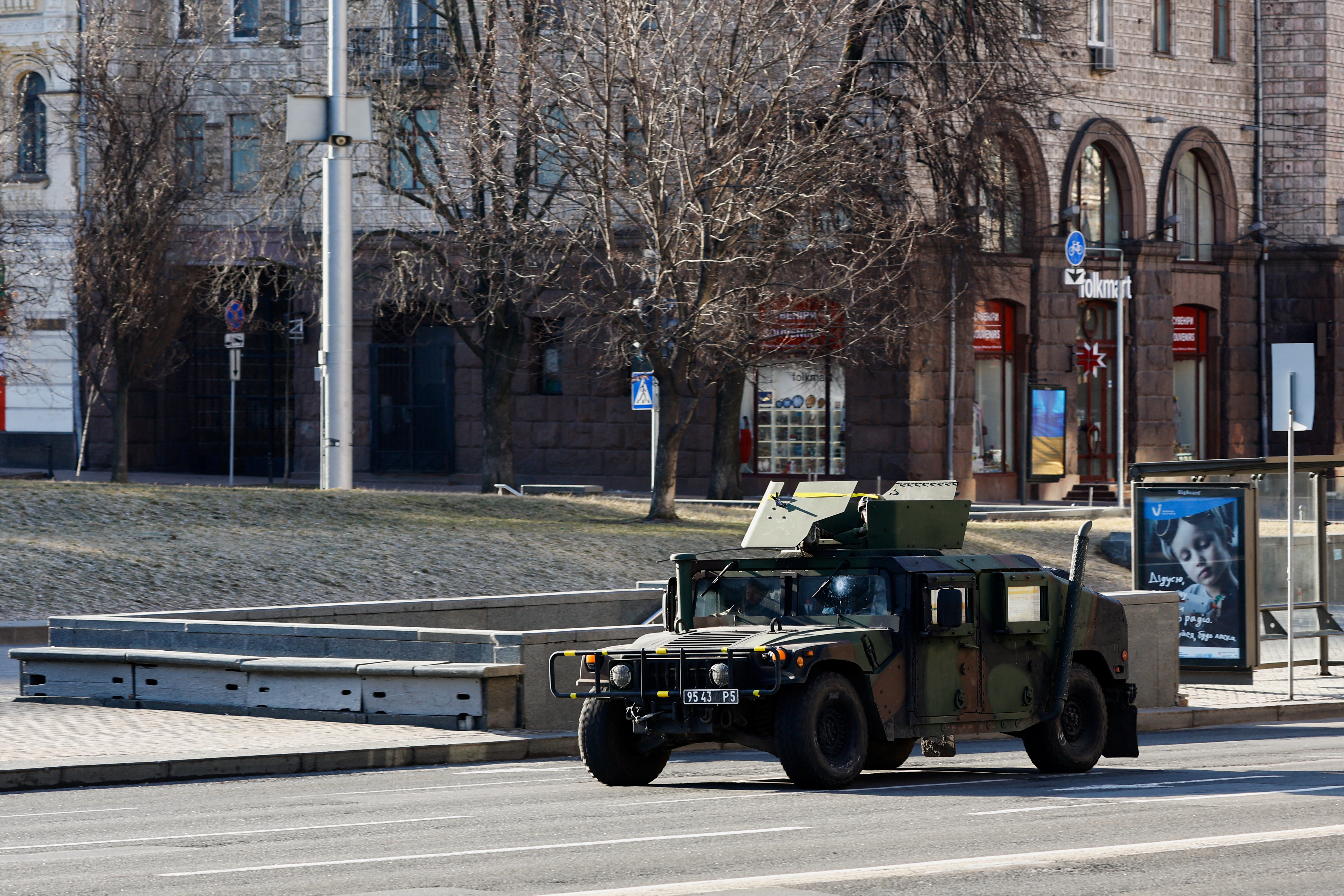 A Ukrainian military vehicle is seen after a curfew in capital Kyiv was lifted