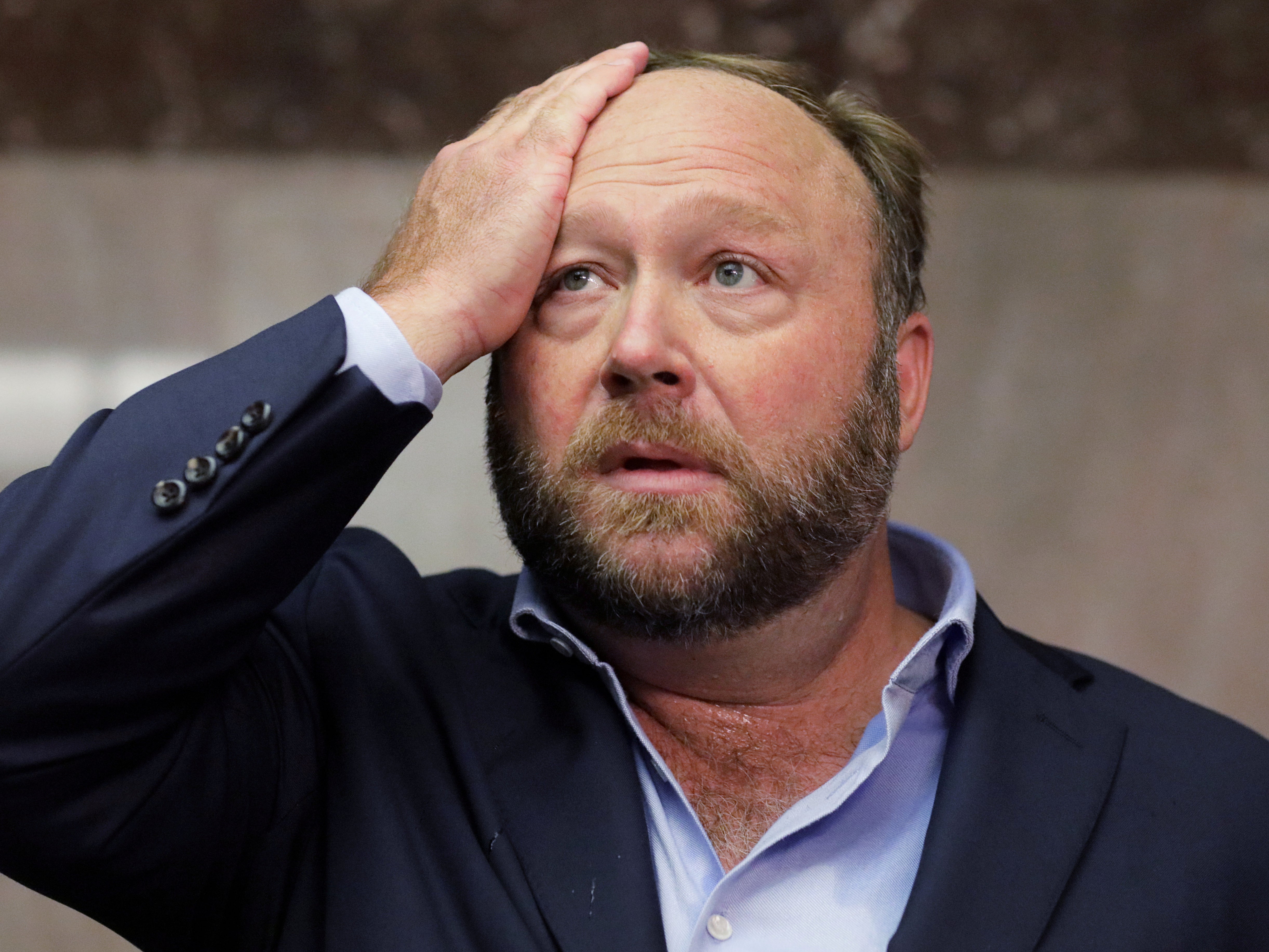 InfoWars host Alex Jones failed to appear for his deposition for a second day