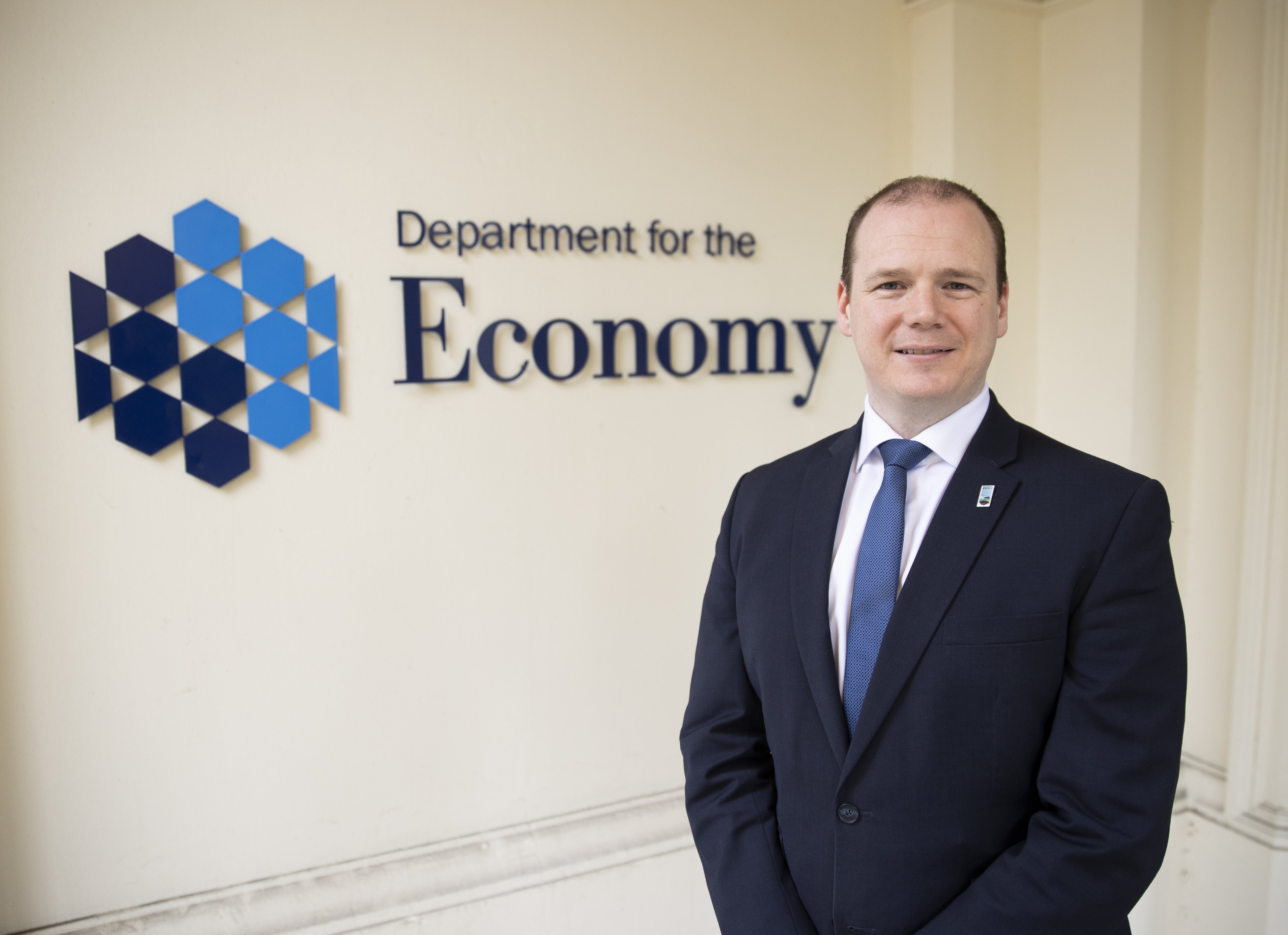 Northern Ireland Economy Minister Gordon Lyons at Netherleigh Buildings, Belfast (PA)