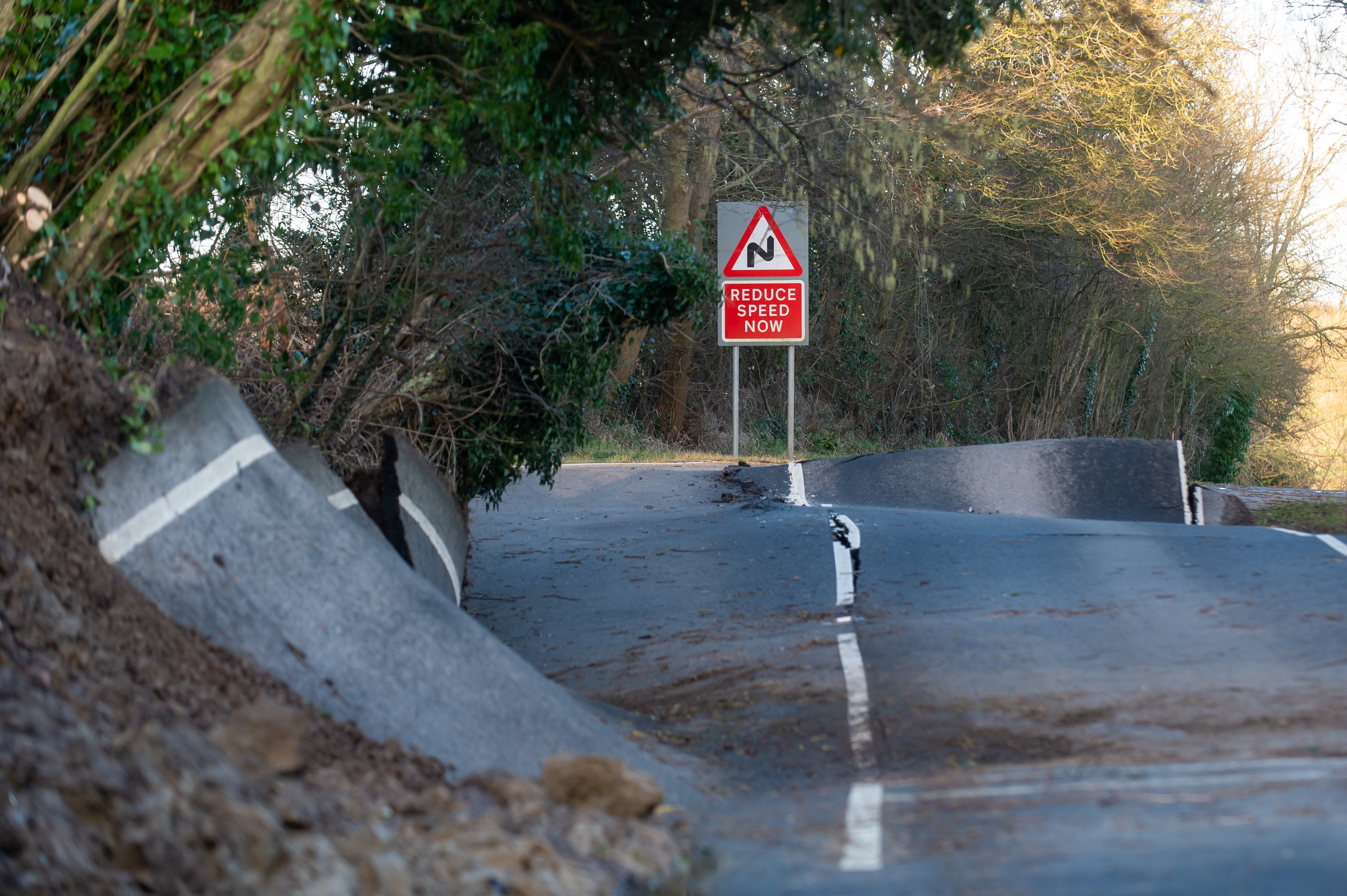 The B4069 near Lyneham which has been severely damaged