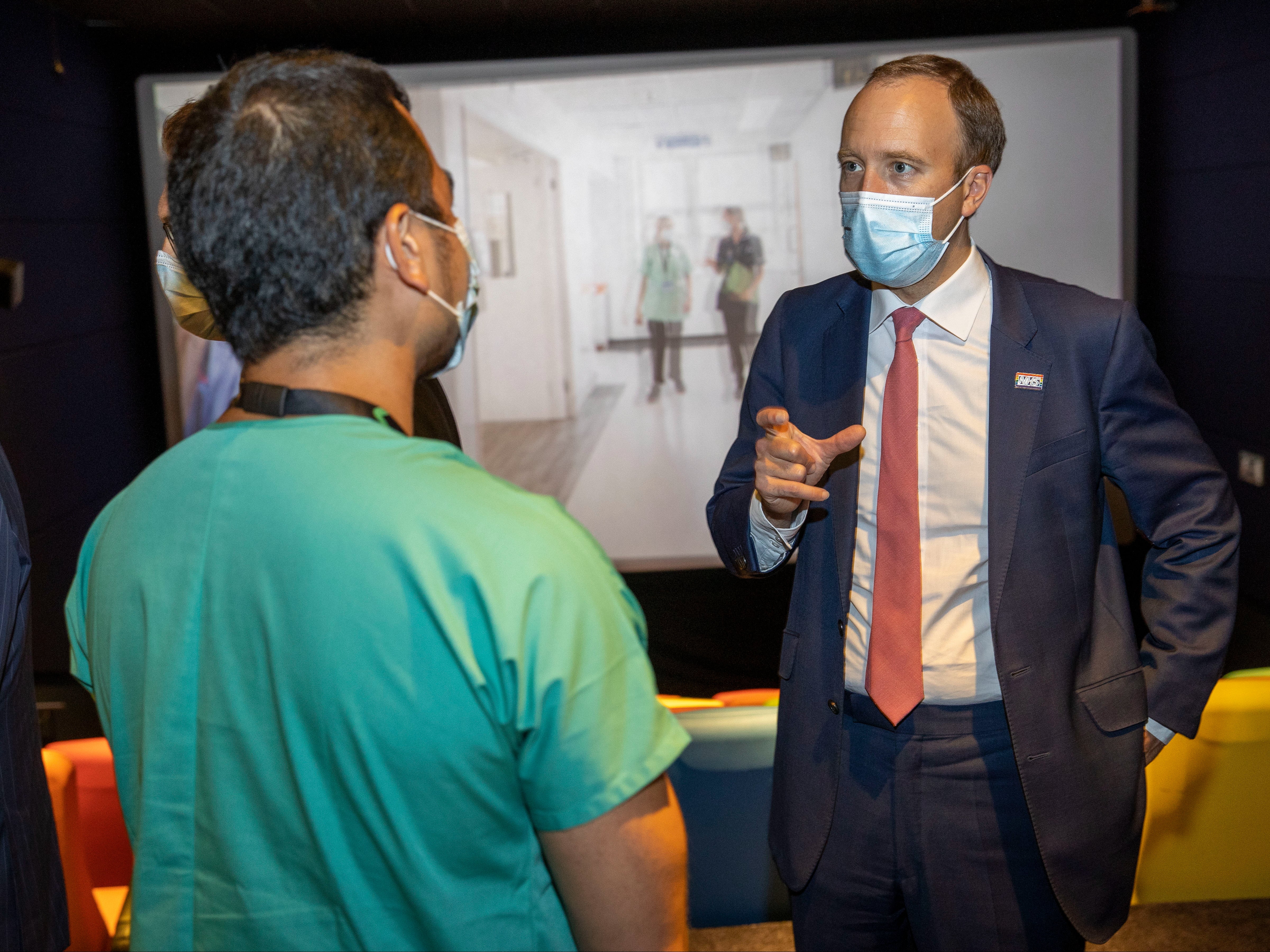 Then health secretary Matt Hancock meets NHS staff during a visit to the Chelsea & Westminster Hospital on 17 June 2021