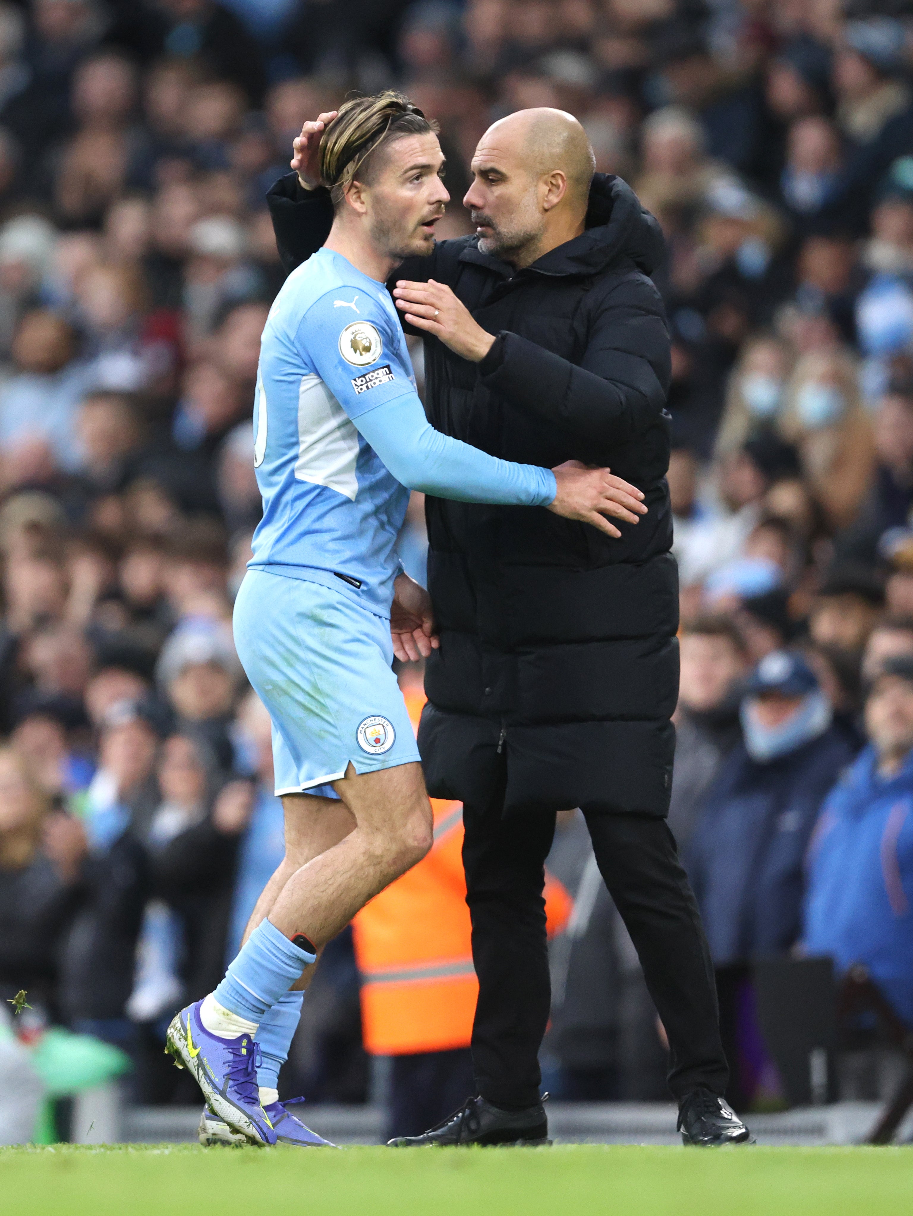 Guardiola (right) has no concerns about Grealish’s performances (Richard Sellers/PA)