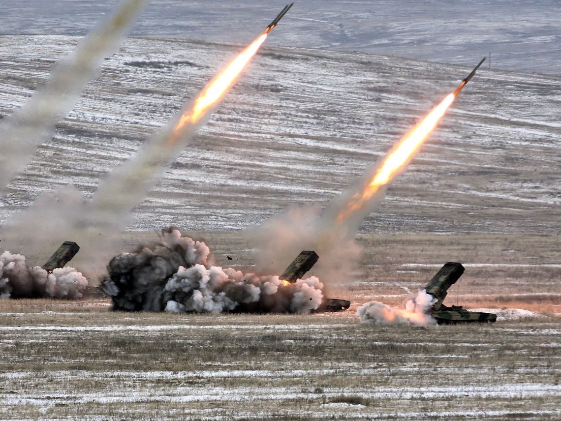 Russian TOS-1 rocket launchers firing thermobaric weapons