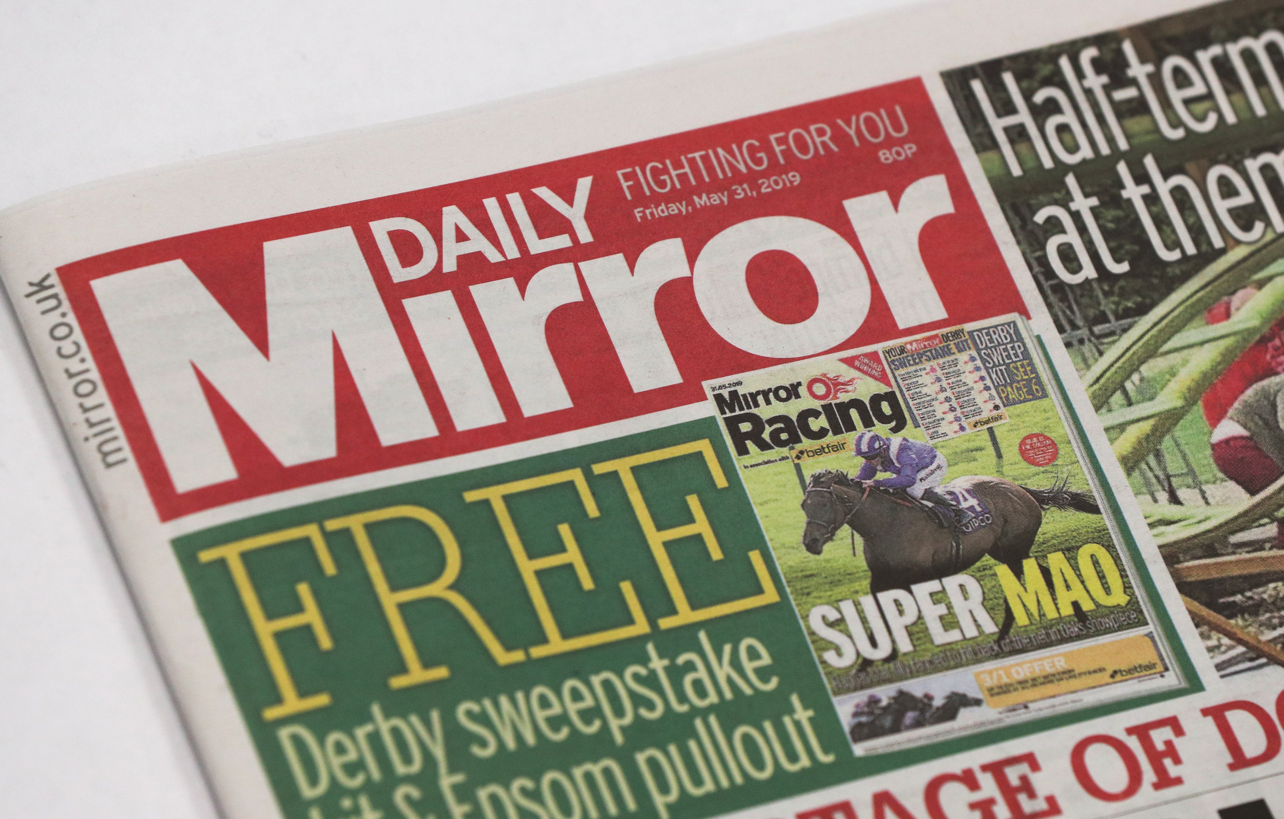 The publisher of the Mirror and Express newspapers has seen shares plunge as it warned that higher printing costs are set to impact profits this year (Jonathan Brady/PA)