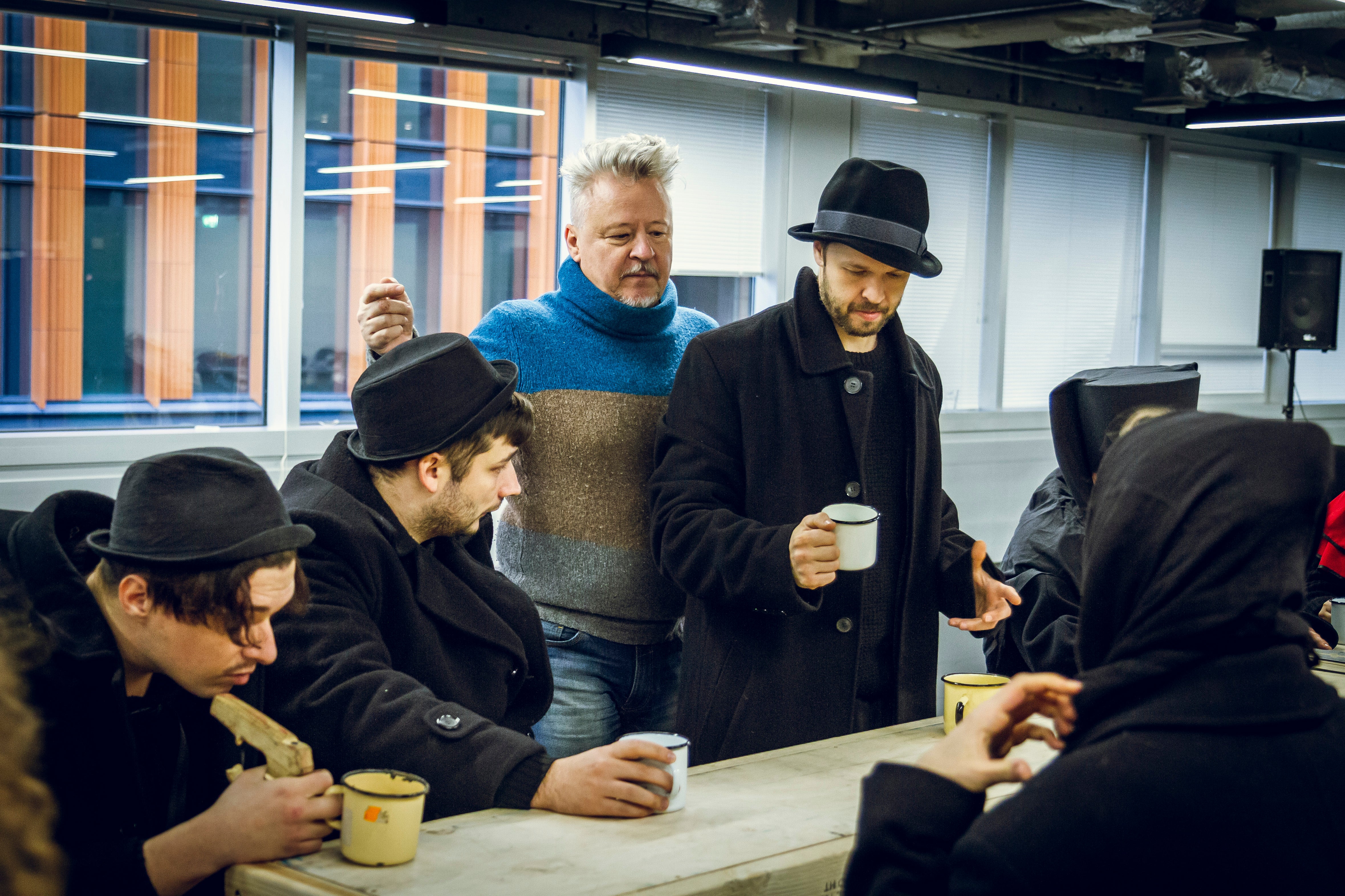 Nicolai Khalezin (centre) directs rehearsals