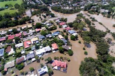Australia at climate ‘precipice’, scientists warn, as major flooding hits eastern areas of country
