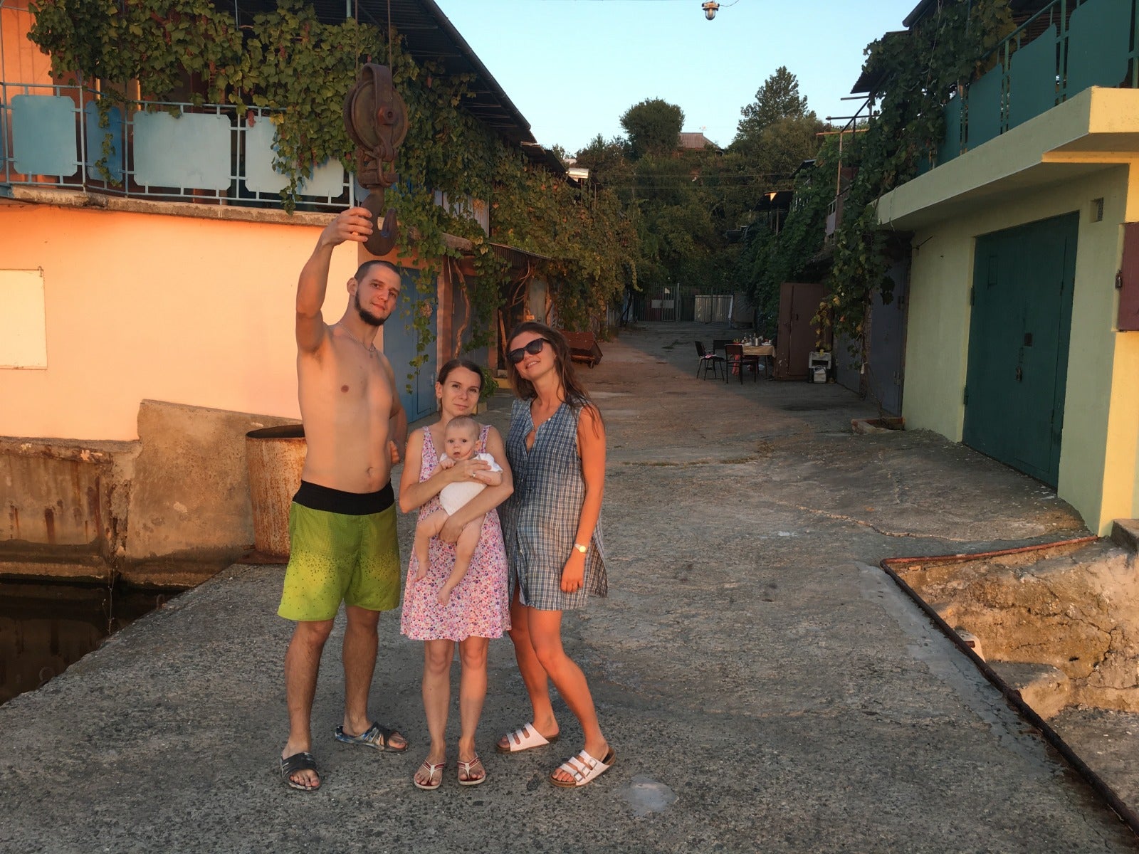 Ms Bykova (right) with her cousin Roman (left), who has stayed in Ukraine to fight, his wife Julia and their child Miroslava (middle), who fled to the Czech Republic