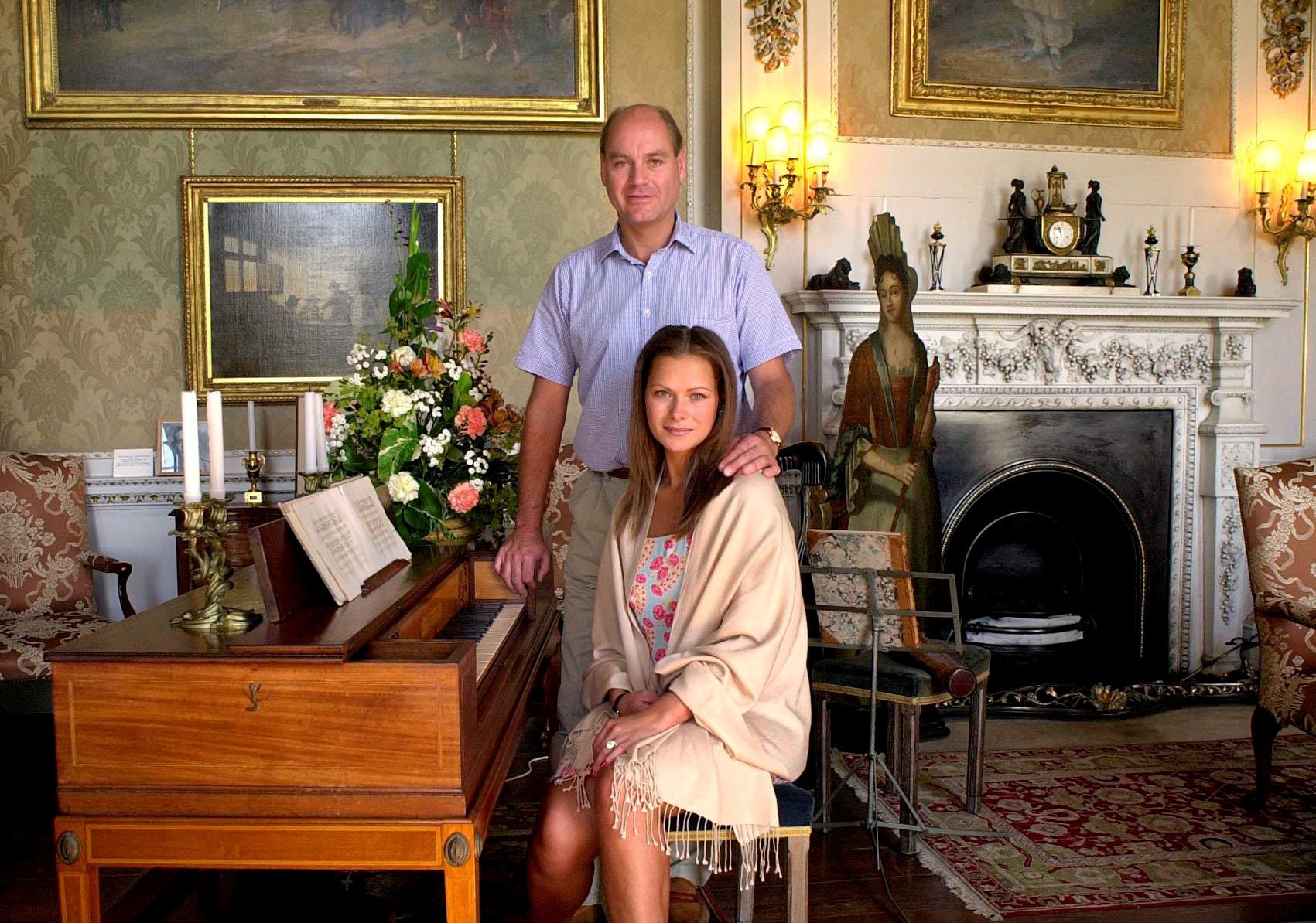 Simon Howard and his wife Rebecca, who married in 2001