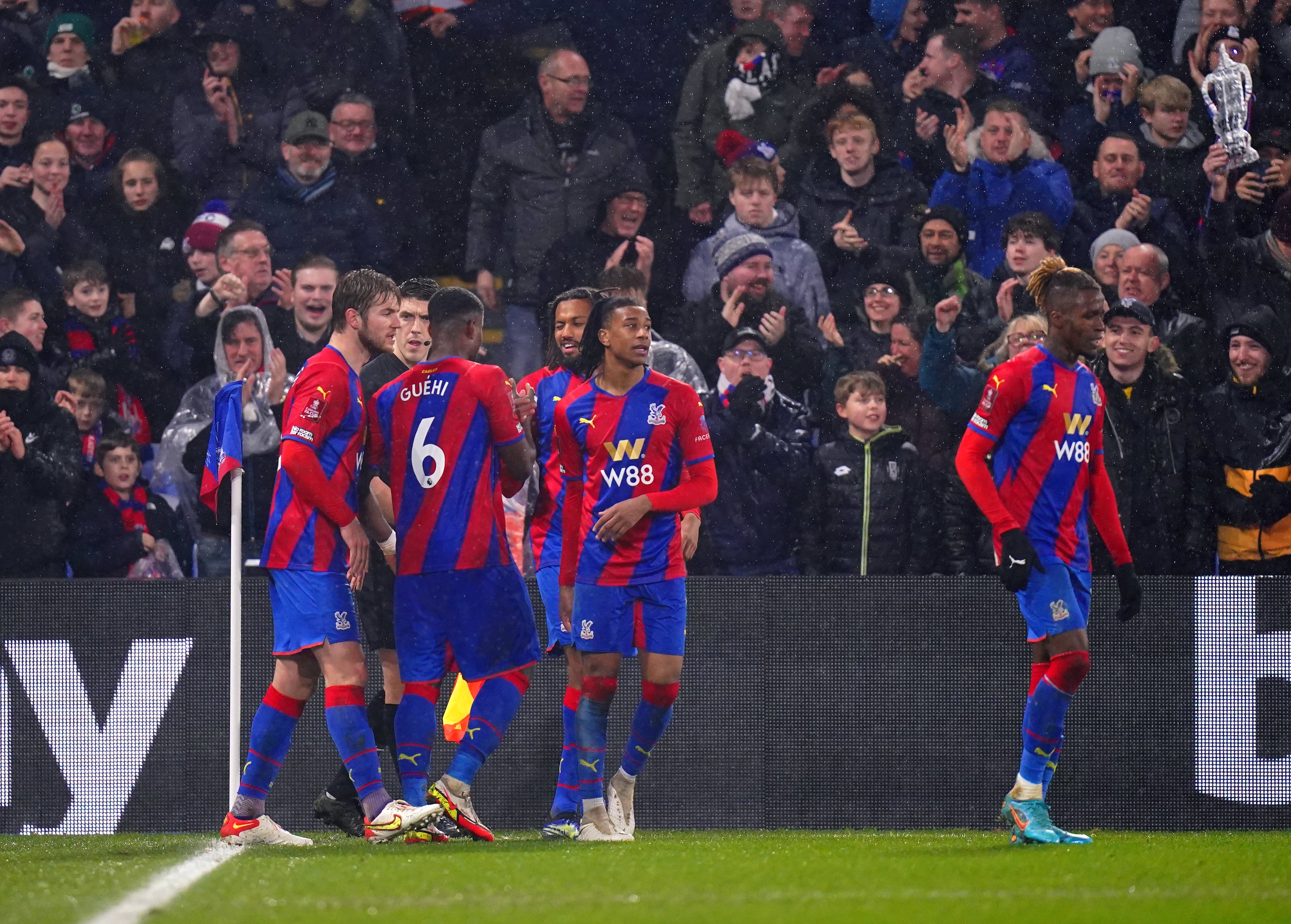 Crystal Palace players celebrate Jairo Riedewald’s winner against Stoke