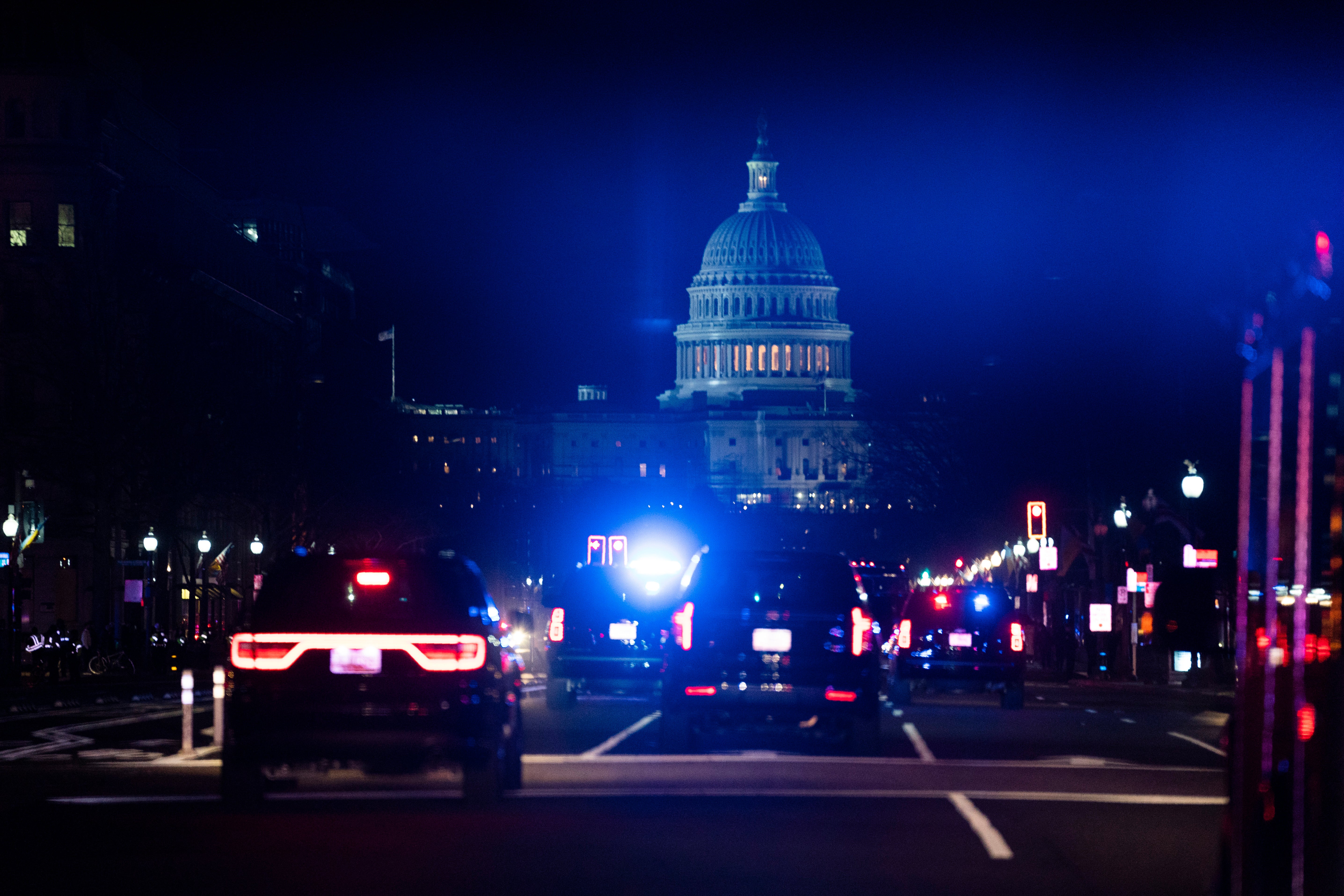 The motorcade carrying President Joe Biden drives to the Capitol building for his first State of the Union address to a joint session of Congress