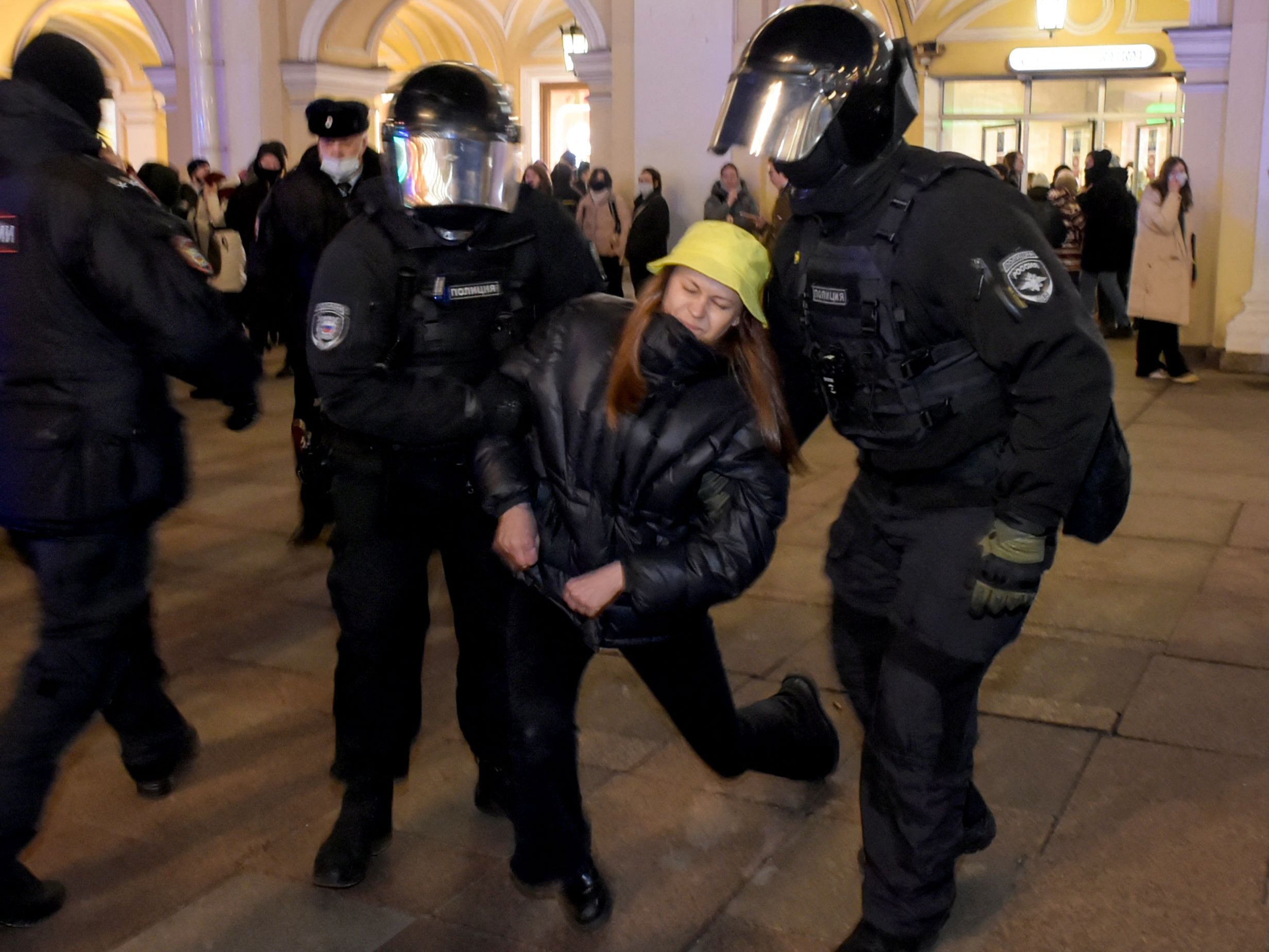 Police arrest a demonstrator during a protest in St Petersburg against Russia’s war on Ukraine