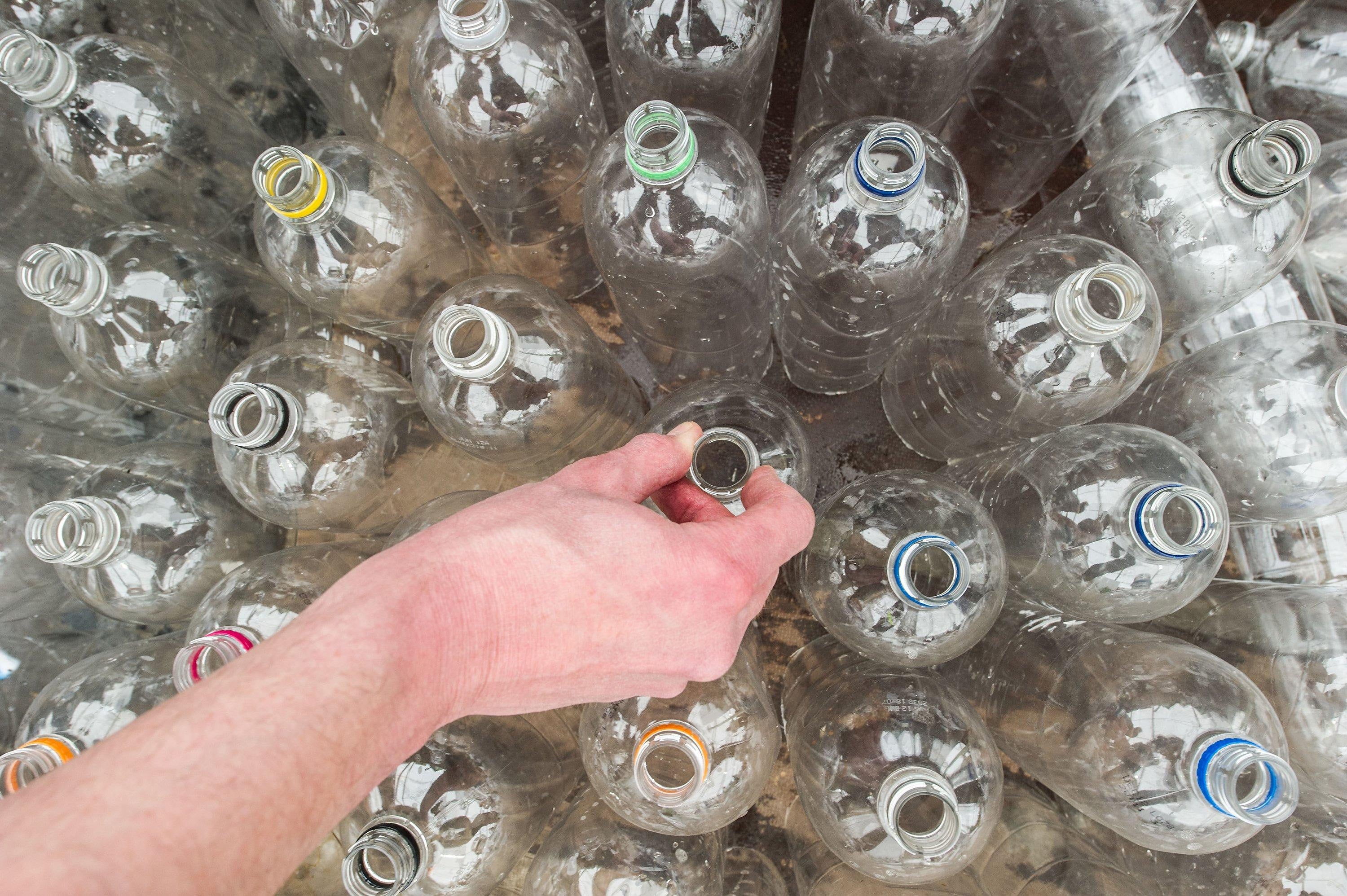 The youngster wants plastic water bottles used in schools replaced with reusable containers (PA)