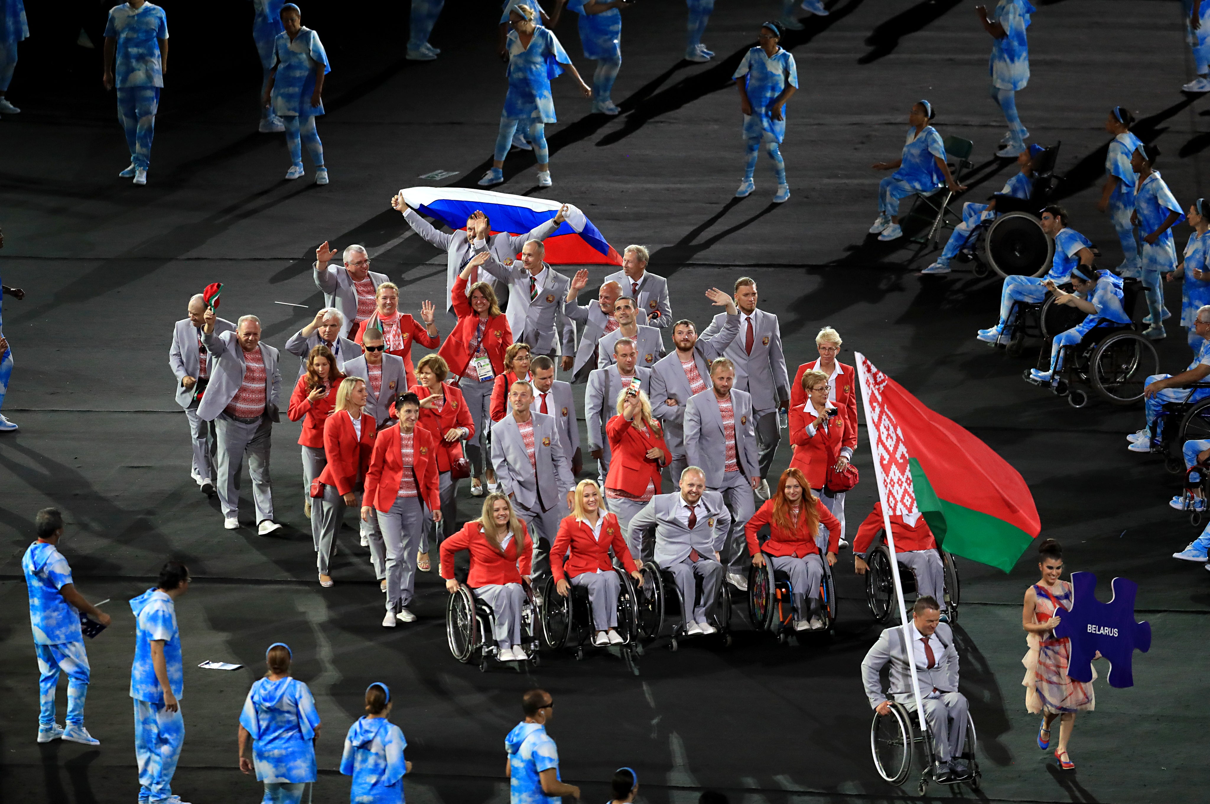 The Belarus team with a member waving a Russian flag during the opening ceremony of the 2016 Rio Paralympic Games (Adam Davy/PA