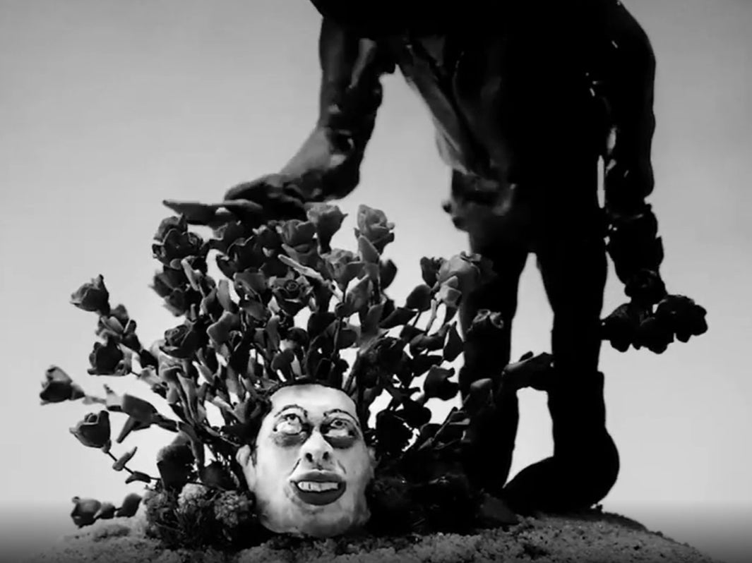 A still from the strange music video shared by West