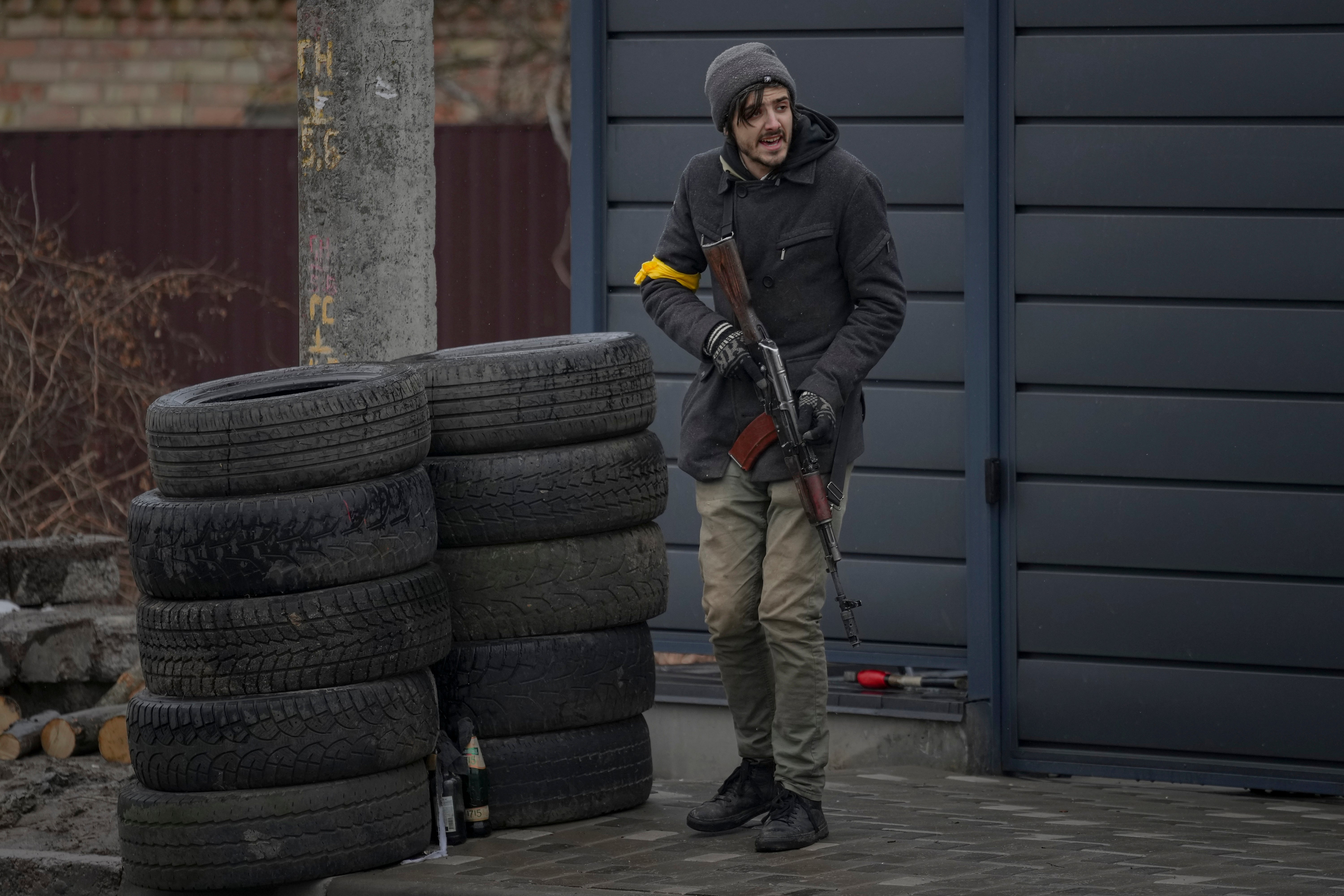 A member of the civil defence mans a checkpoint in Gorenka, outside the capital Kyiv, Ukraine, Wednesday, March 2, 2022