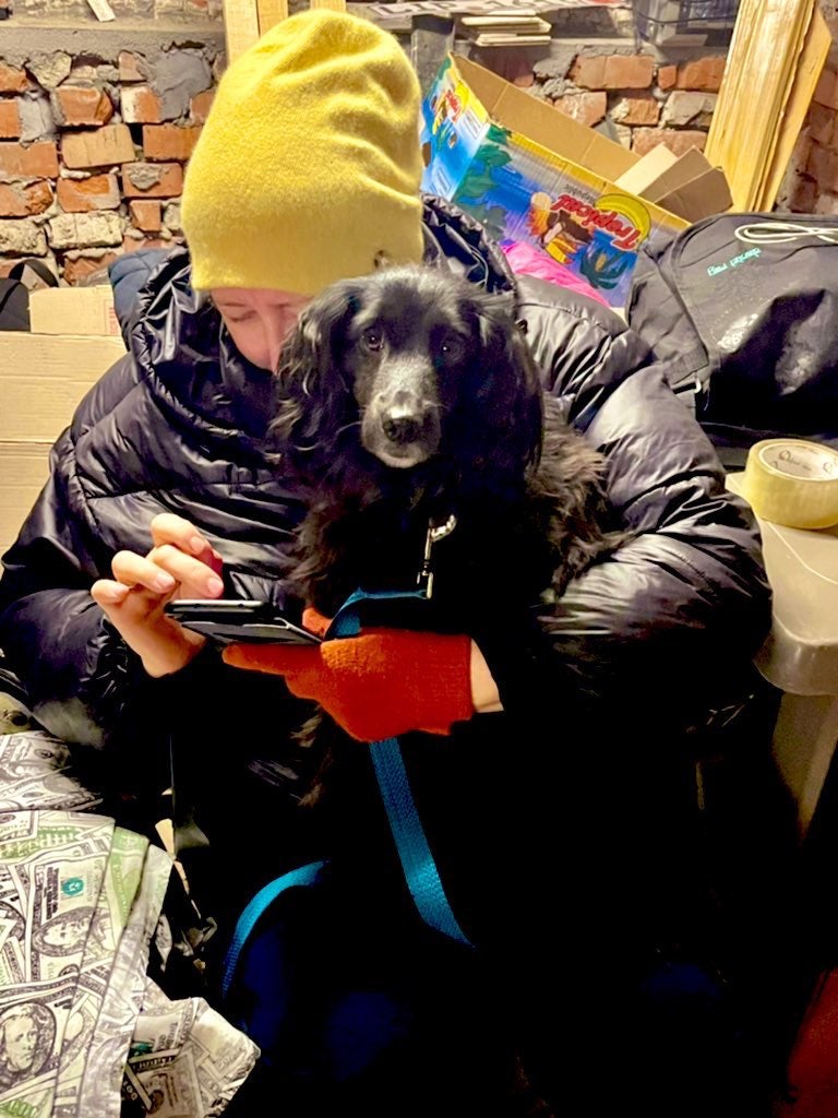 People shelter with their pets in Khmelnytskyi, Ukraine