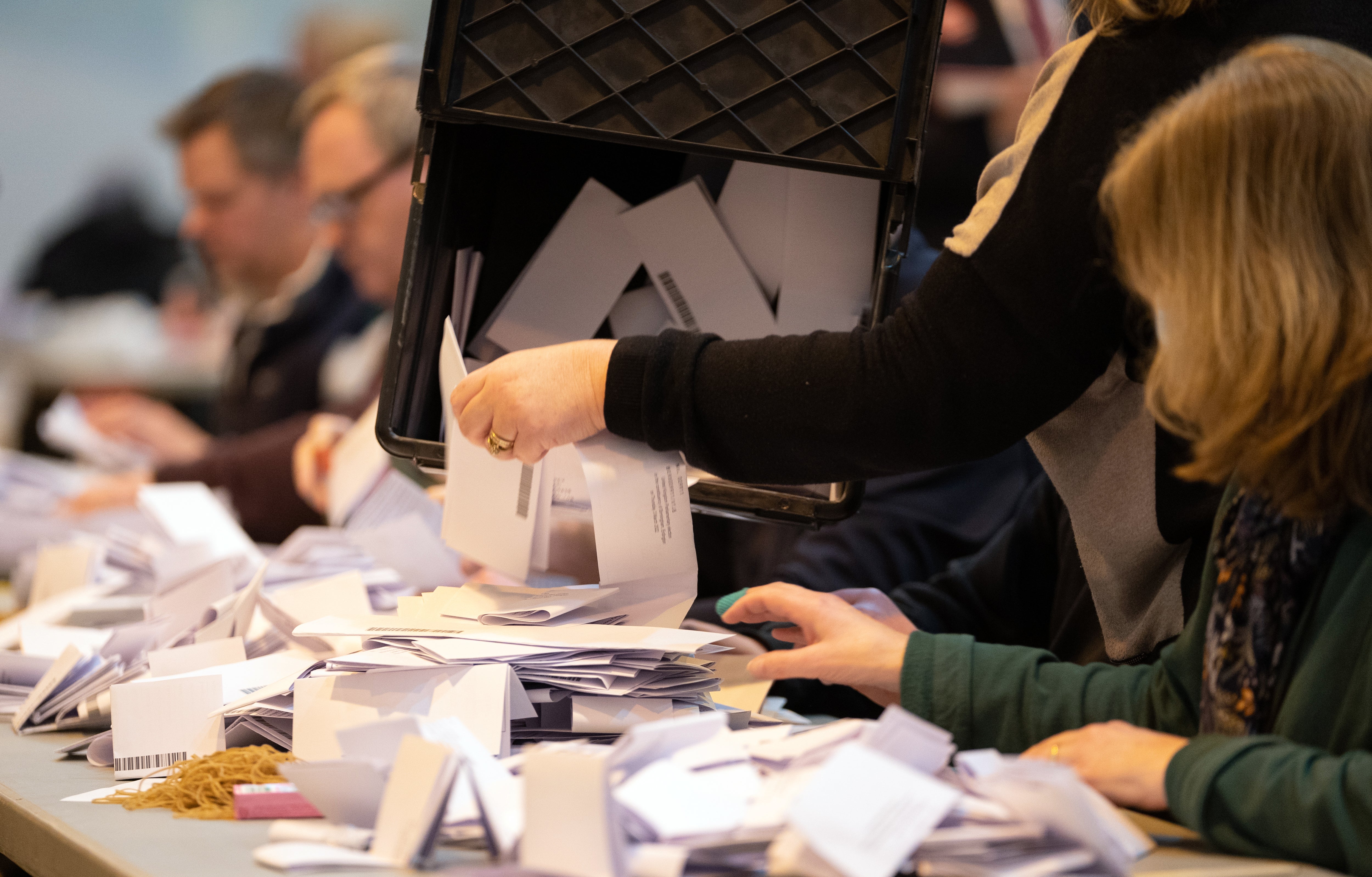 Ballot papers are sorted and verified at Erdington Academy during the count for the Erdington by-election (PA)
