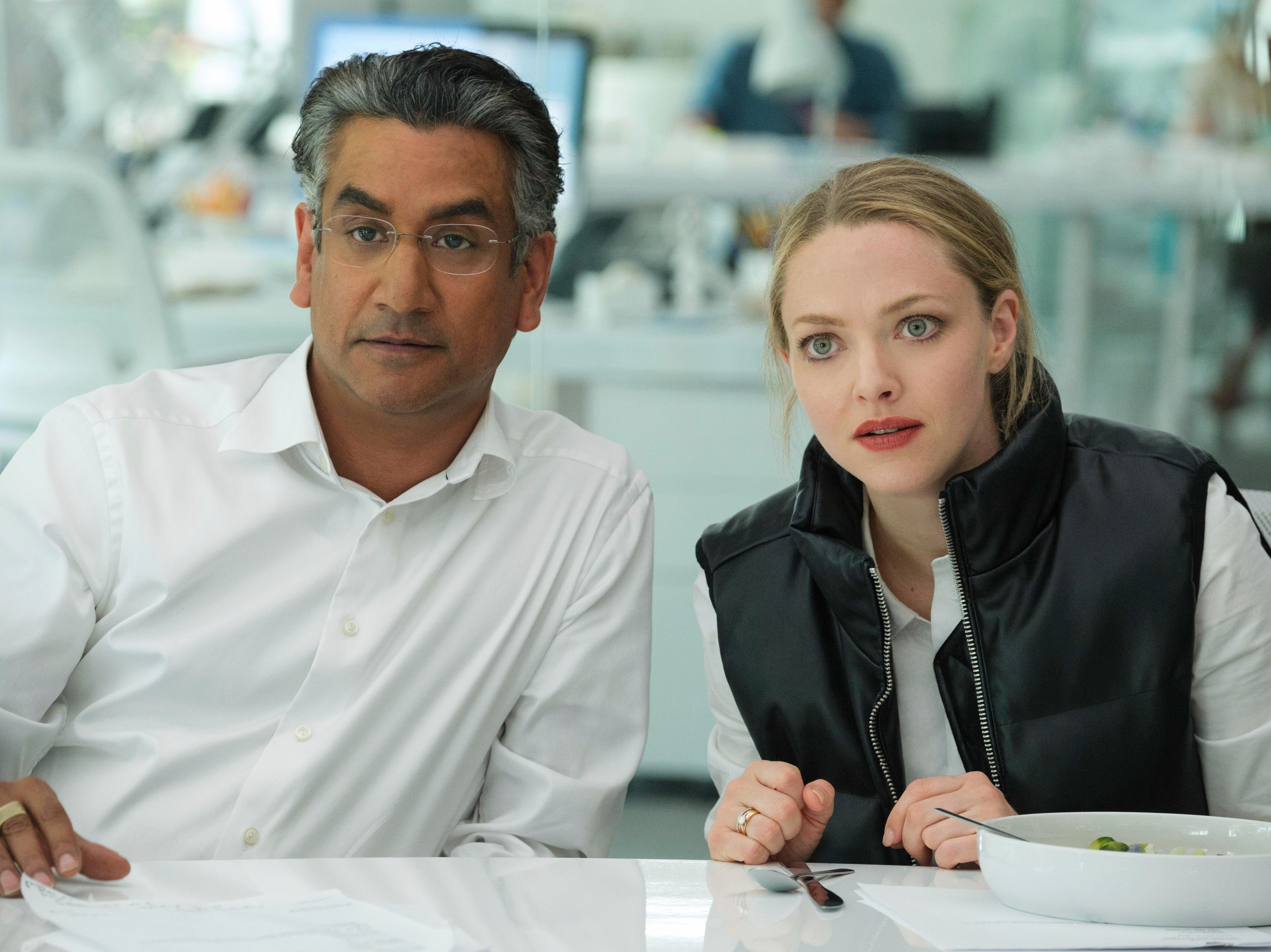 Naveen Andrews as Sunny Balwani, left, and Amanda Seyfried as Elizabeth Holmes in ‘The Dropout’