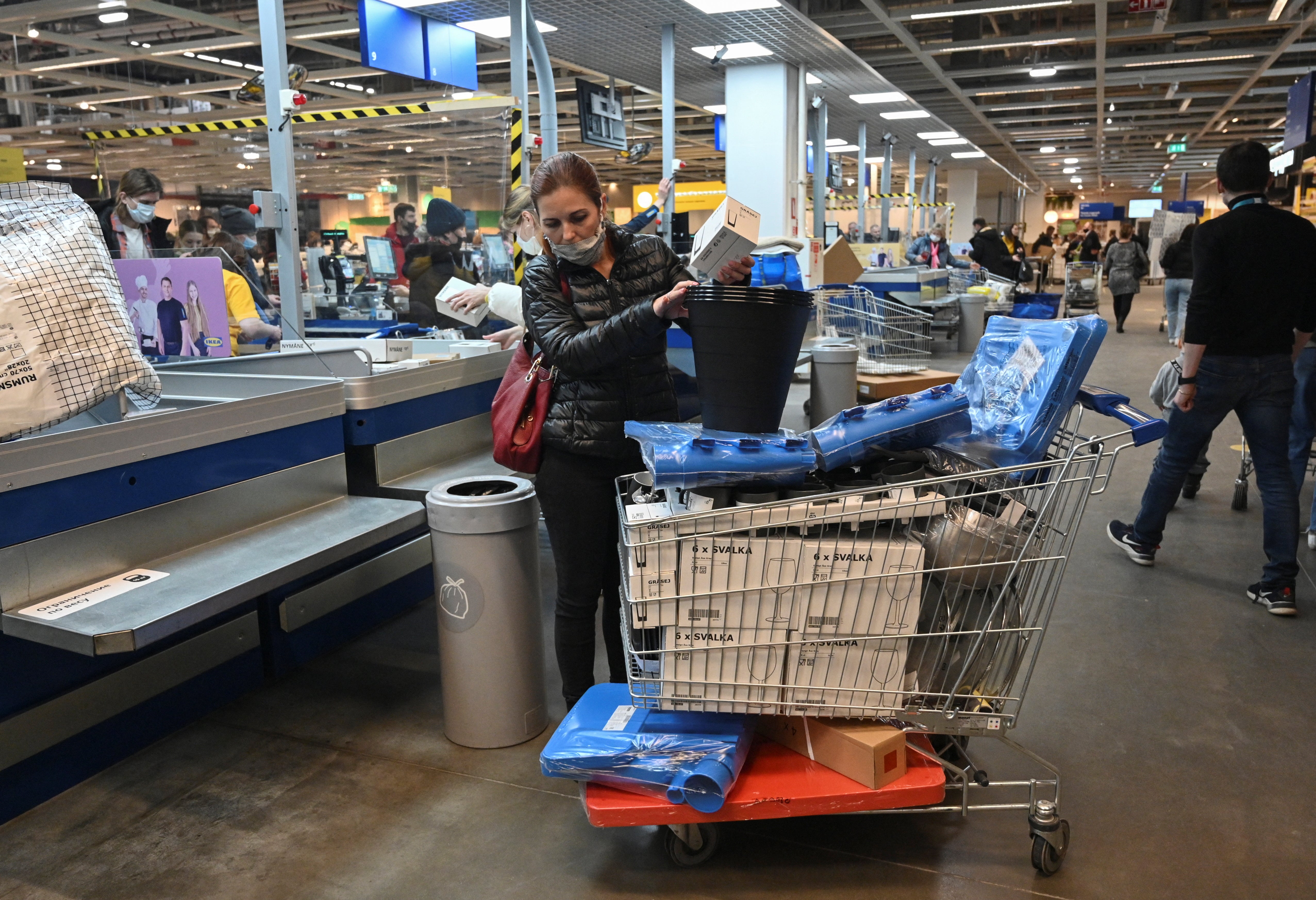 One shopper crams products into her trolley at the Ikea store in Rostov-on-Don, Russia.