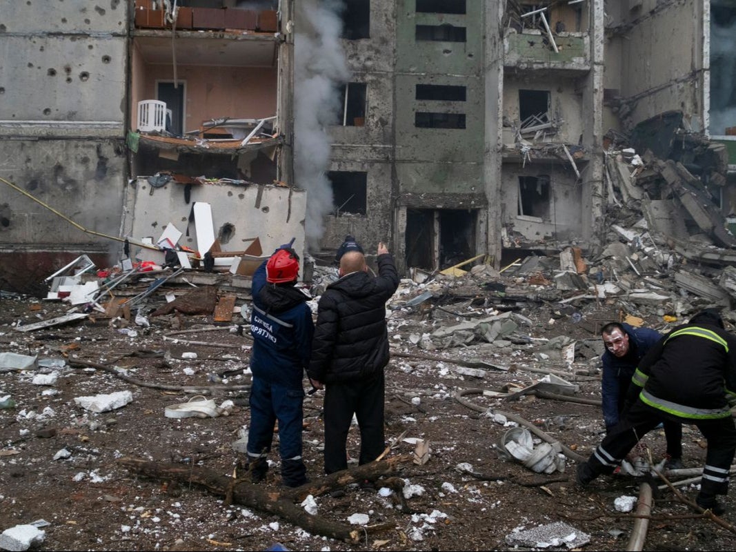 Emergency services assess the destruction caused to the neighbourhood