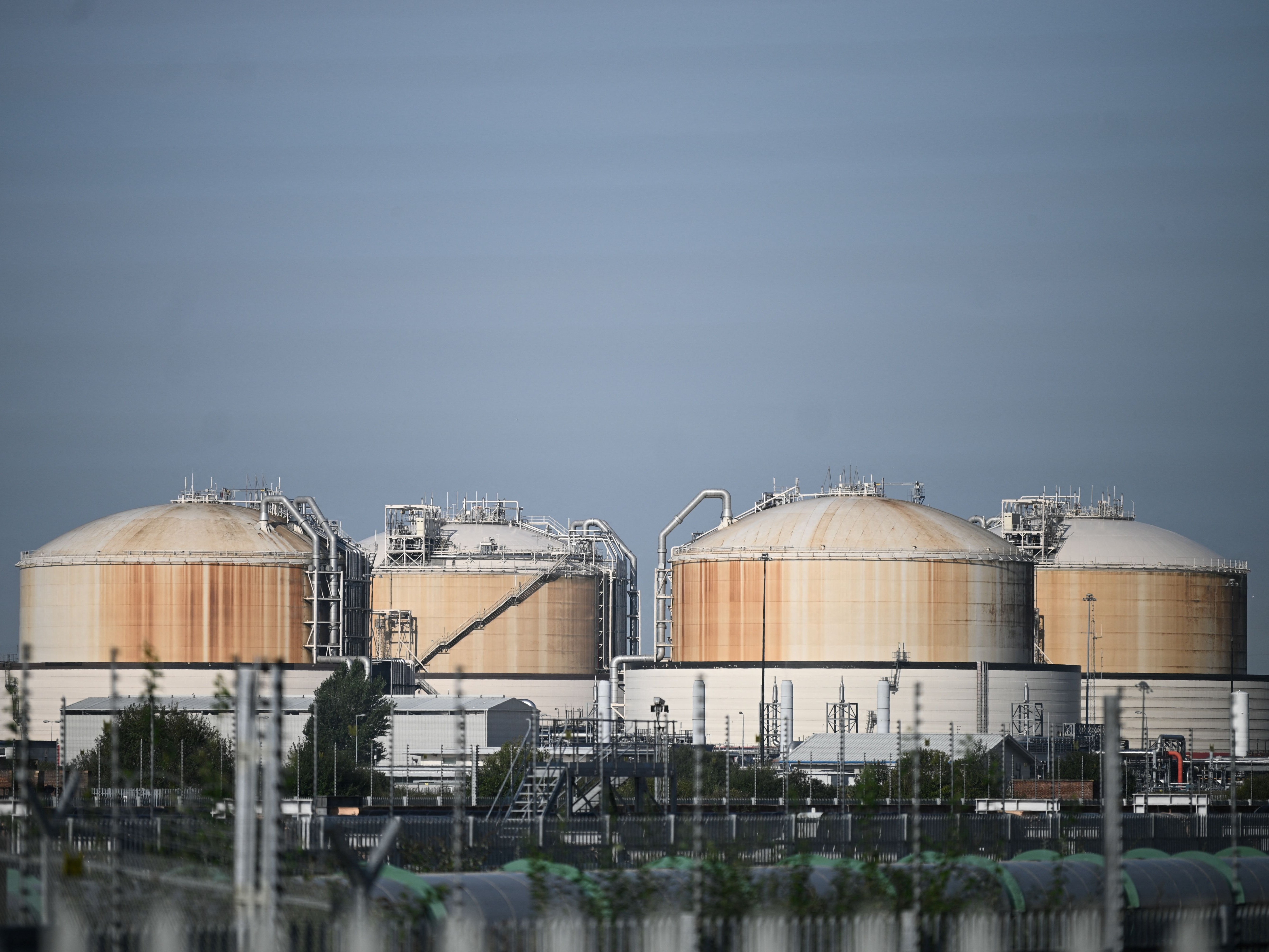 Liquefied Natural Gas (LNG) storage tanks are seen at the Grain LNG import terminal on the Isle of Grain, Kent